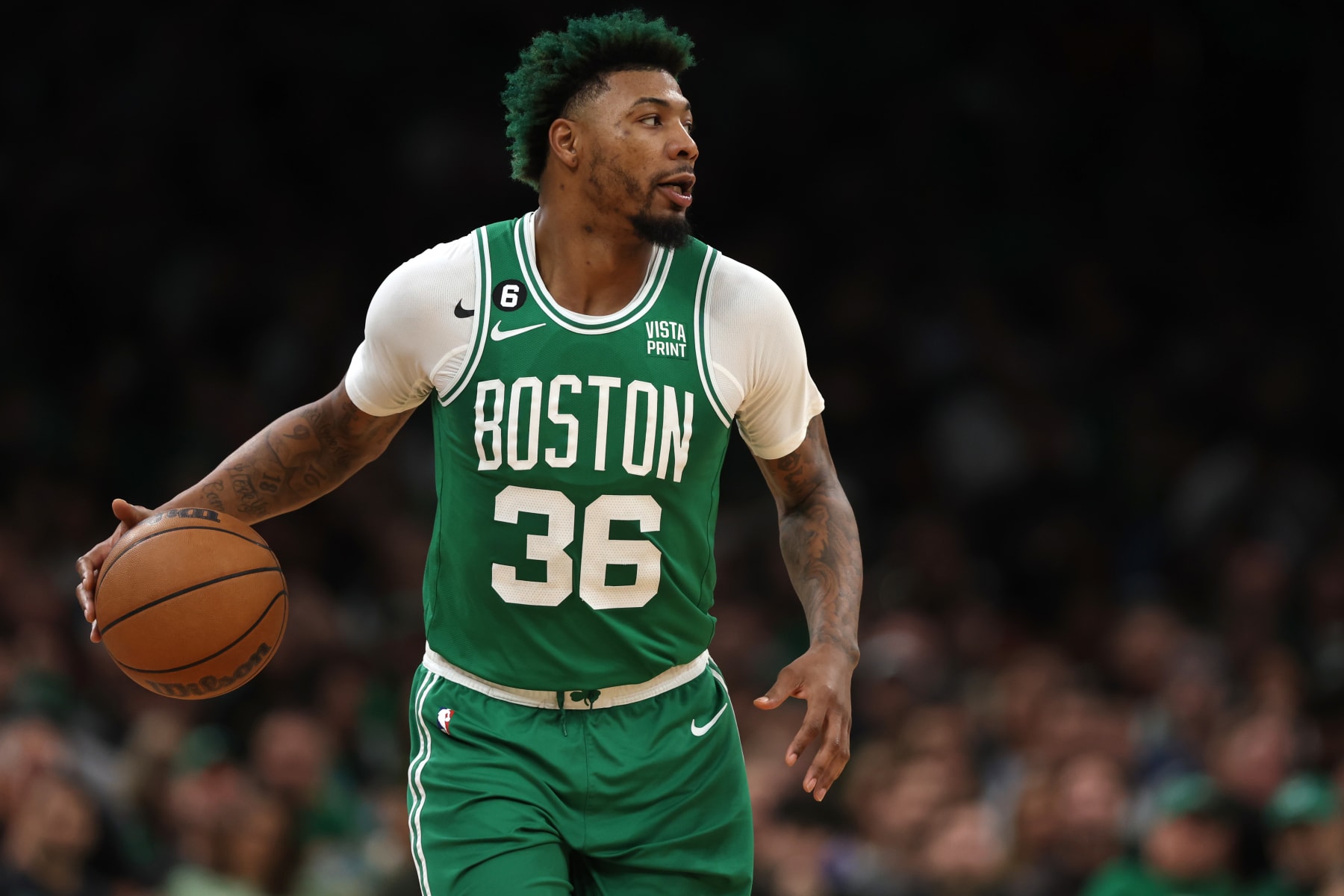 BOSTON, MASSACHUSETTS - MAY 03: Marcus Smart #36 of the Boston Celtics dribbles downcourt during the first quarter of game two of the Eastern Conference Second Round Playoffs at TD Garden on May 03, 2023 in Boston, Massachusetts. NOTE TO USER: User expressly acknowledges and agrees that, by downloading and or using this photograph, User is consenting to the terms and conditions of the Getty Images License Agreement. (Photo by Maddie Meyer/Getty Images)