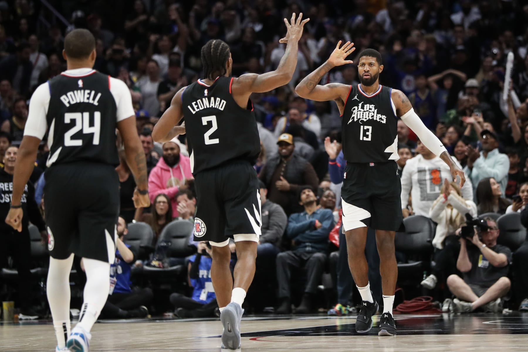 LOS ANGELES, CALIFORNIA - DECEMBER 02: Paul George #13 of the LA Clippers reacts to his shot in the end of the fourth quarter against the Golden State Warriors with Kawhi Leonard #2 at Crypto.com Arena on December 02, 2023 in Los Angeles, California. NOTE TO USER: User expressly acknowledges and agrees that, by downloading and or using this photograph, User is consenting to the terms and conditions of the Getty Images License Agreement. (Photo by Meg Oliphant/Getty Images)