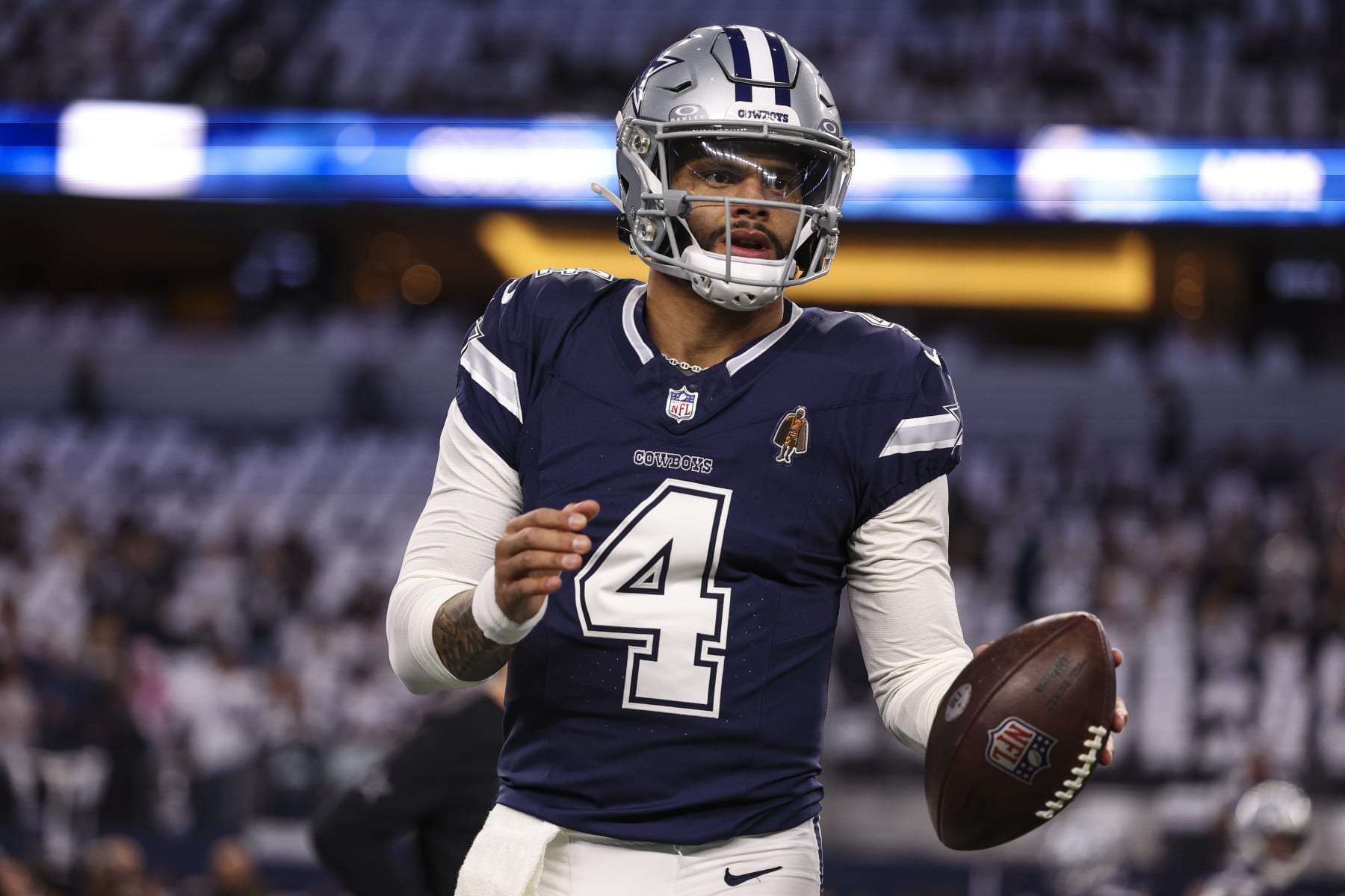 ARLINGTON, TX - DECEMBER 30: Dak Prescott #4 of the Dallas Cowboys warms up prior to an NFL football game against the Detroit Lions at AT&T Stadium on December 30, 2023 in Arlington, Texas. (Photo by Perry Knotts/Getty Images)