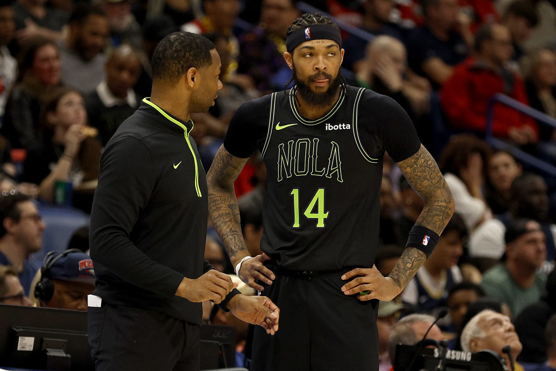 NEW ORLEANS, LOUISIANA - MARCH 15: New Orleans Pelicans head coach Willie Green talks with Brandon Ingram #14 of the New Orleans Pelicans during the fourth quarter of an NBA game at Smoothie King Center on March 15, 2024 in New Orleans, Louisiana. NOTE TO USER: User expressly acknowledges and agrees that, by downloading and or using this photograph, User is consenting to the terms and conditions of the Getty Images License Agreement. (Photo by Sean Gardner/Getty Images)