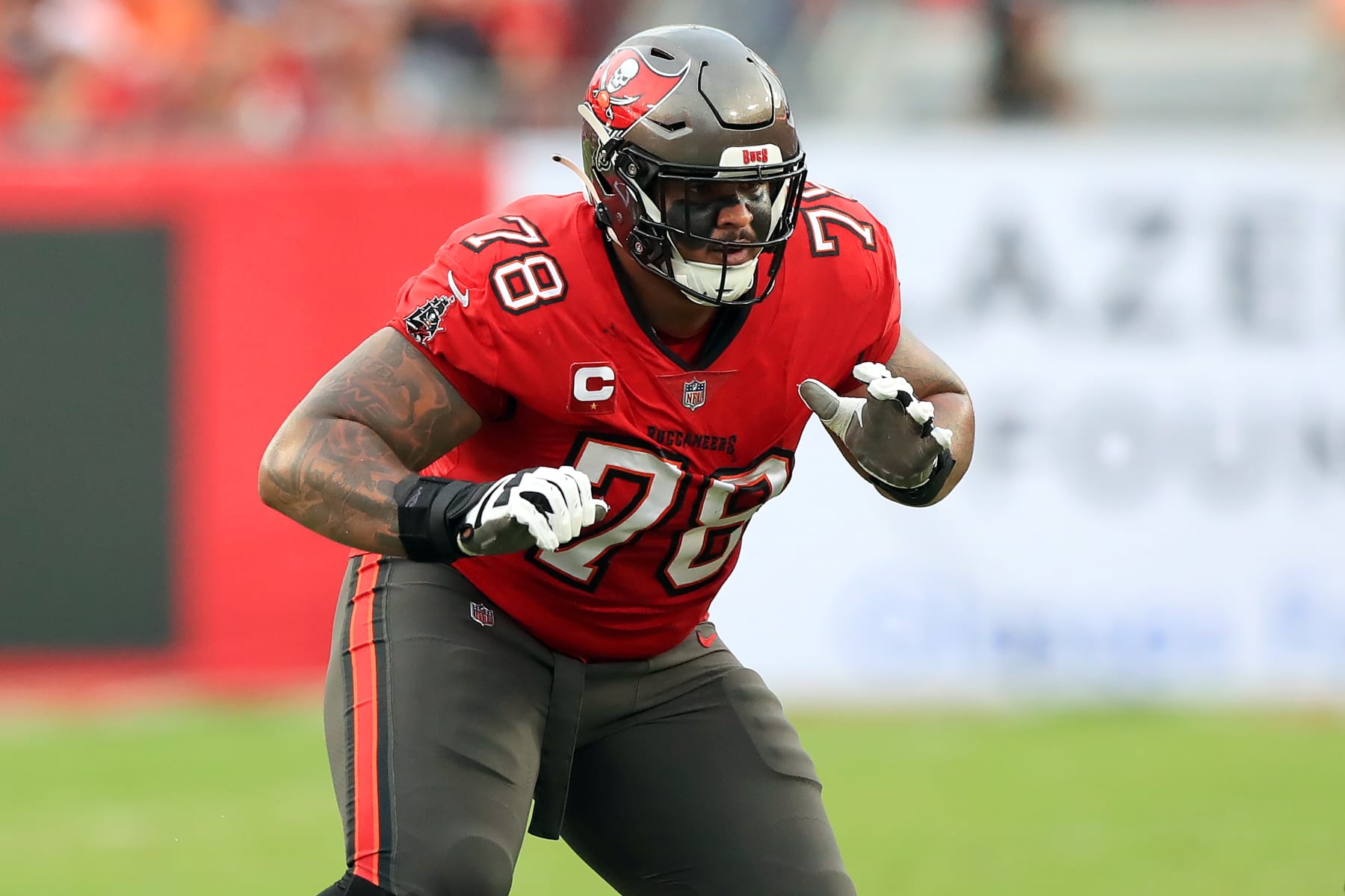TAMPA, FL - DECEMBER 24: Tampa Bay Buccaneers Offensive Tackle Tristan Wirfs (78) pass blocks during the regular season game between the Jacksonville Jaguars and the Tampa Bay Buccaneers on December 24, 2023 at Raymond James Stadium in Tampa, Florida. (Photo by Cliff Welch/Icon Sportswire via Getty Images)