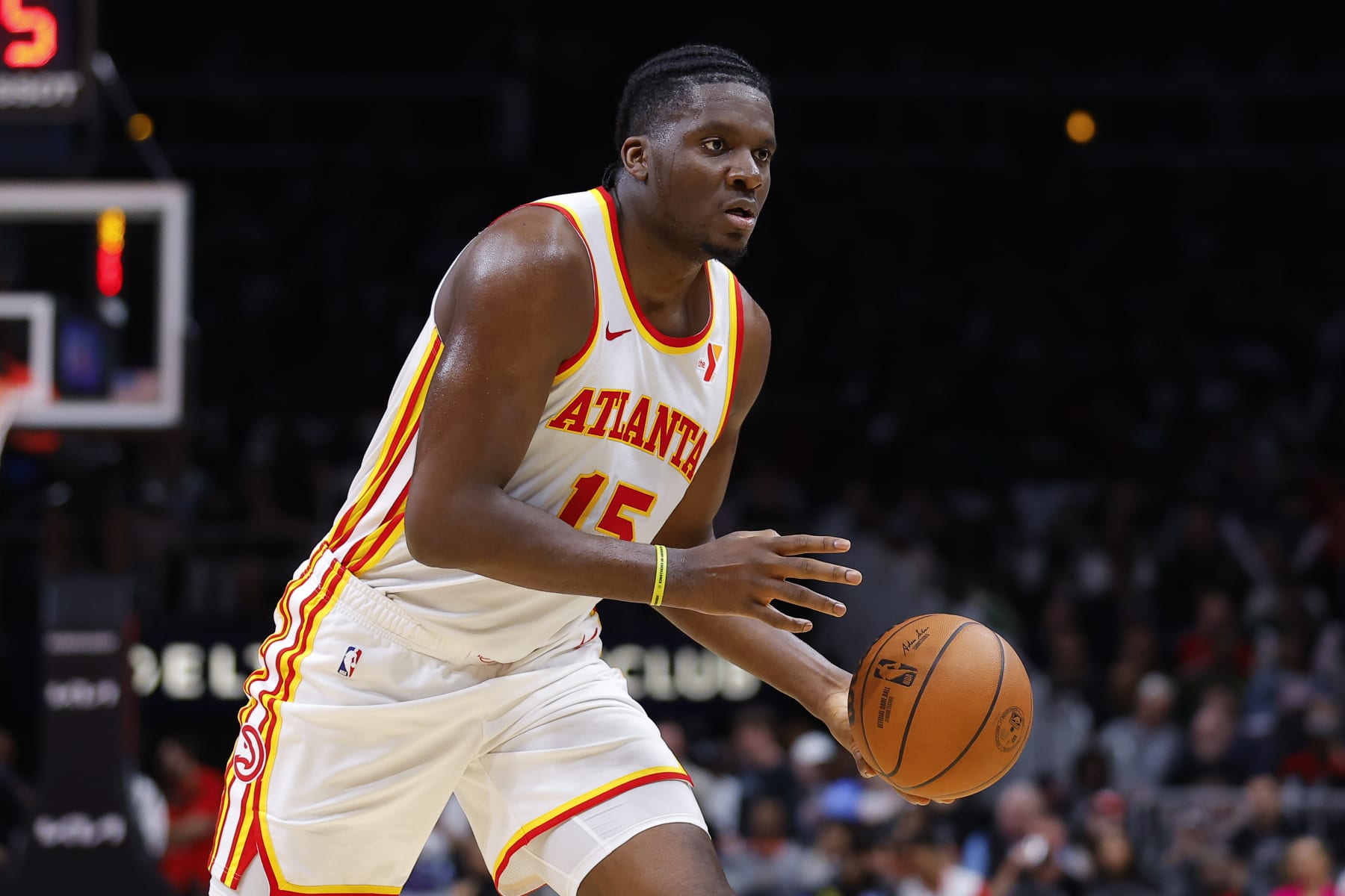 ATLANTA, GEORGIA - JANUARY 26: Clint Capela #15 of the Atlanta Hawks passes during the third quarter against the Dallas Mavericks at State Farm Arena on January 26, 2024 in Atlanta, Georgia. NOTE TO USER: User expressly acknowledges and agrees that, by downloading and or using this photograph, User is consenting to the terms and conditions of the Getty Images License Agreement. (Photo by Todd Kirkland/Getty Images)