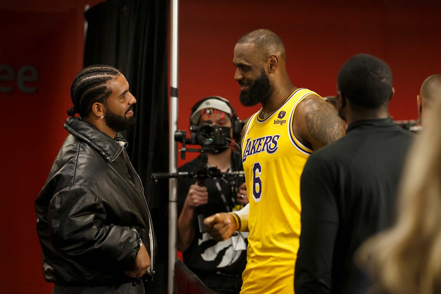 TORONTO, ON - MARCH 18: Drake and LeBron James #6 of the Los Angeles Lakers talk after the NBA game between the Toronto Raptors and the Los Angeles Lakers at Scotiabank Arena on March 18, 2022 in Toronto, Canada. NOTE TO USER: User expressly acknowledges and agrees that, by downloading and or using this Photograph, user is consenting to the terms and conditions of the Getty Images License Agreement. (Photo by Cole Burston/Getty Images)