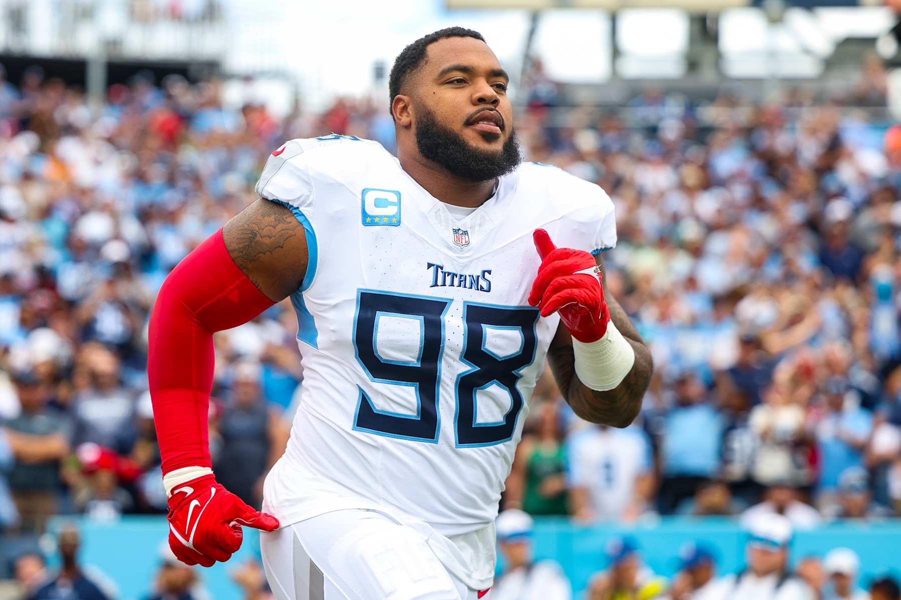 NASHVILLE, TN - SEPTEMBER 15: Jeffery Simmons #98 of the Tennessee Titans runs out of the tunnel prior to an NFL football game against the New York Jets at Nissan Stadium on September 15, 2024 in Nashville, TN. (Photo by Perry Knotts/Getty Images)