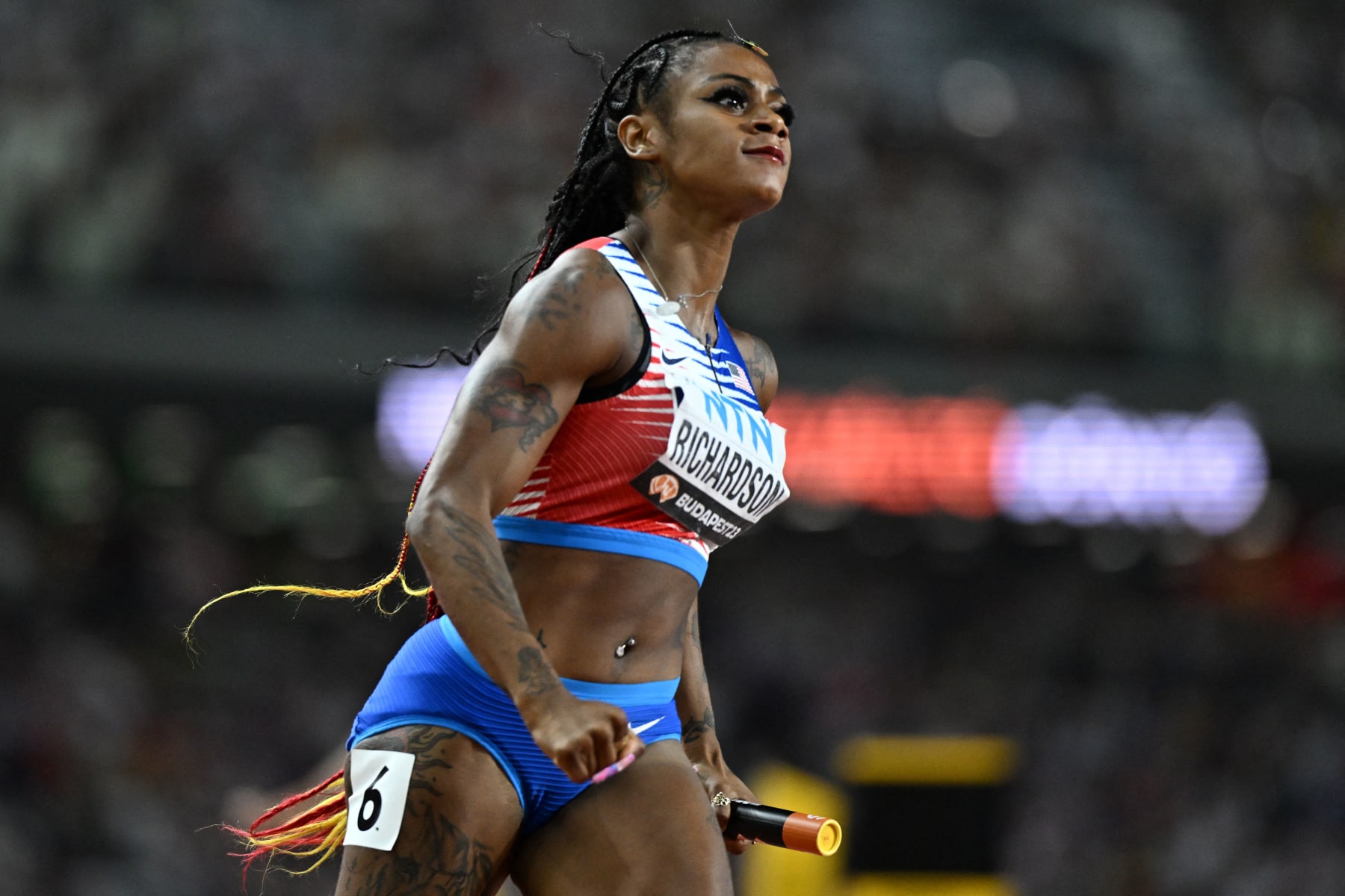 USA's Sha'Carri Richardson reacts after her team won the women's 4x100m relay final during the World Athletics Championships at the National Athletics Centre in Budapest on August 26, 2023. (Photo by Jewel SAMAD / AFP) (Photo by JEWEL SAMAD/AFP via Getty Images)