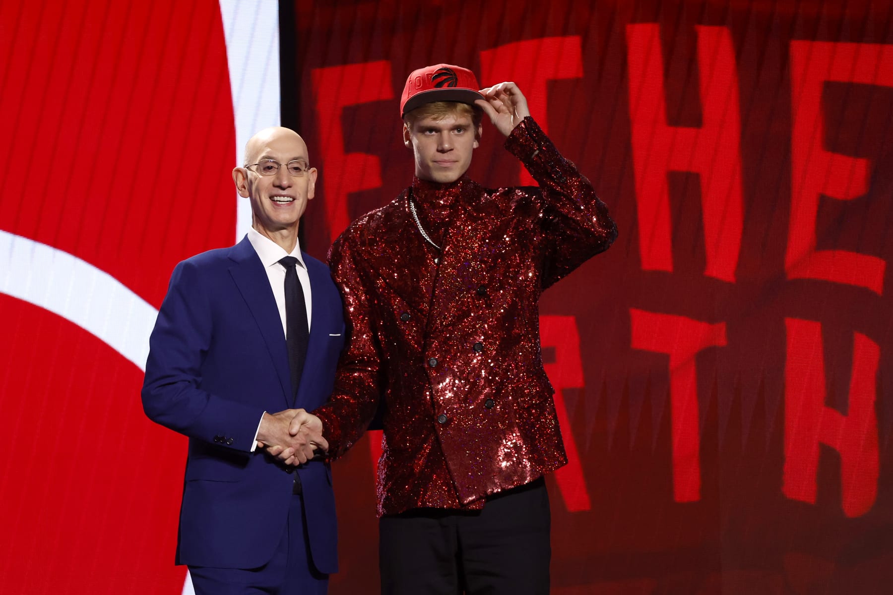 NEW YORK, NEW YORK - JUNE 22: Gradey Dick (R) poses with NBA commissioner Adam Silver (L) after being drafted 13th overall pick by the Toronto Raptors during the first round of the 2023 NBA Draft at Barclays Center on June 22, 2023 in the Brooklyn borough of New York City. NOTE TO USER: User expressly acknowledges and agrees that, by downloading and or using this photograph, User is consenting to the terms and conditions of the Getty Images License Agreement. (Photo by Sarah Stier/Getty Images)