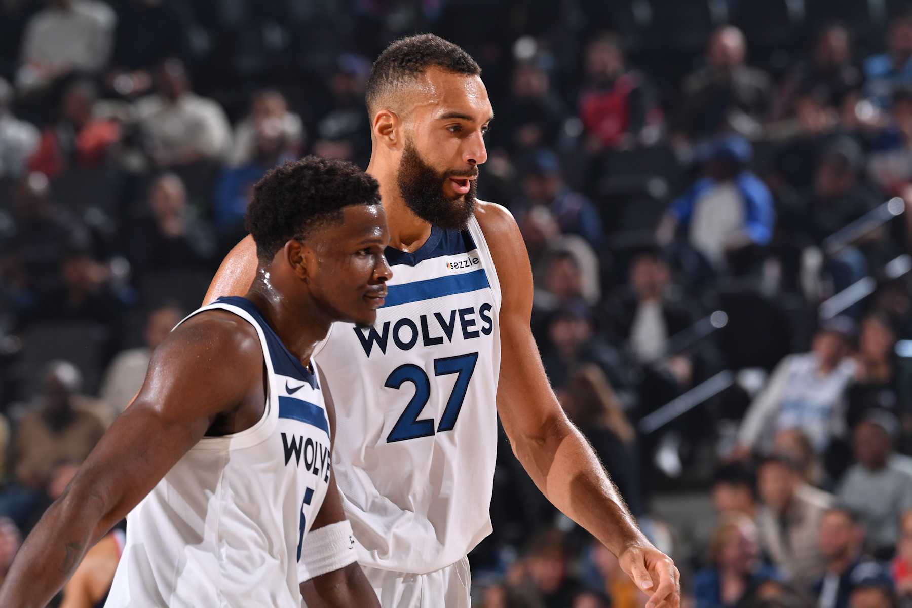 INGLEWOOD, CA - DECEMBER 4: Anthony Edwards #5 and Rudy Gobert #27 of the Minnesota Timberwolves during the game against the LA Clippers  during a regular season game on December 4, 2024 at Intuit Dome in Los Angeles, California. NOTE TO USER: User expressly acknowledges and agrees that, by downloading and/or using this Photograph, user is consenting to the terms and conditions of the Getty Images License Agreement. Mandatory Copyright Notice: Copyright 2024 NBAE (Photo by Juan Ocampo/NBAE via Getty Images)