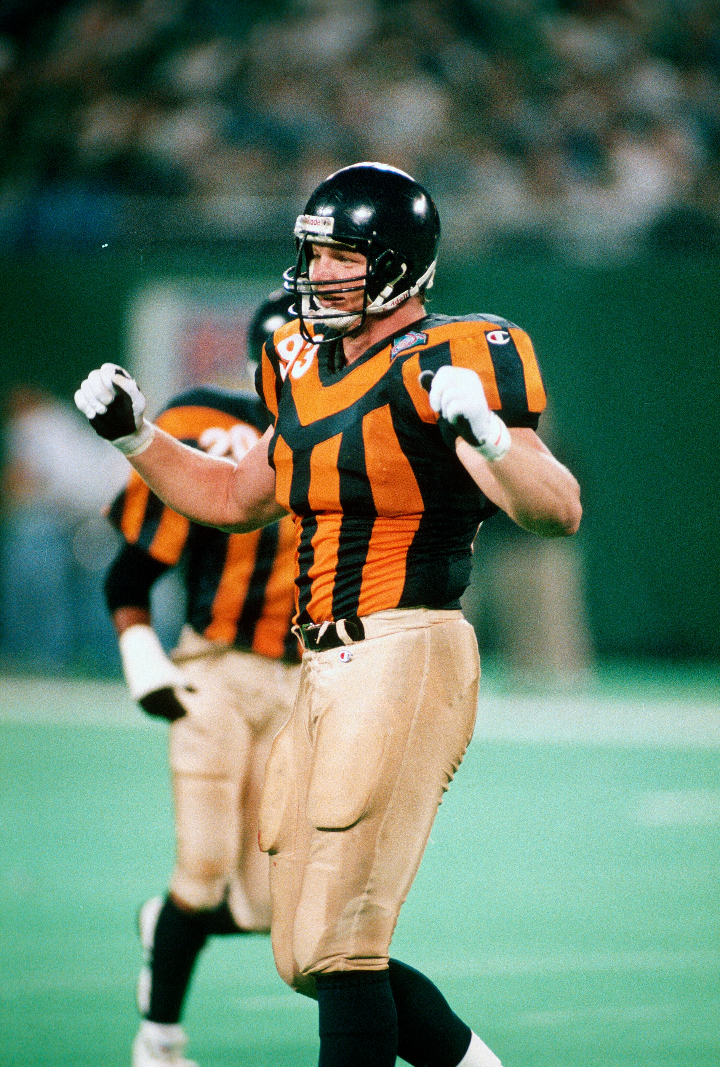 EAST RUTHERFORD, NJ - SEPTEMBER 25:  Trace Armstrong #93 of the Chicago Bears reacts after a play against the New York Jets during an NFL football game September 25, 1994 at Giants Stadium in East Rutherford, New Jersey. Armstrong played for the Bears from 1989-94. (Photo by Focus on Sport/Getty Images)