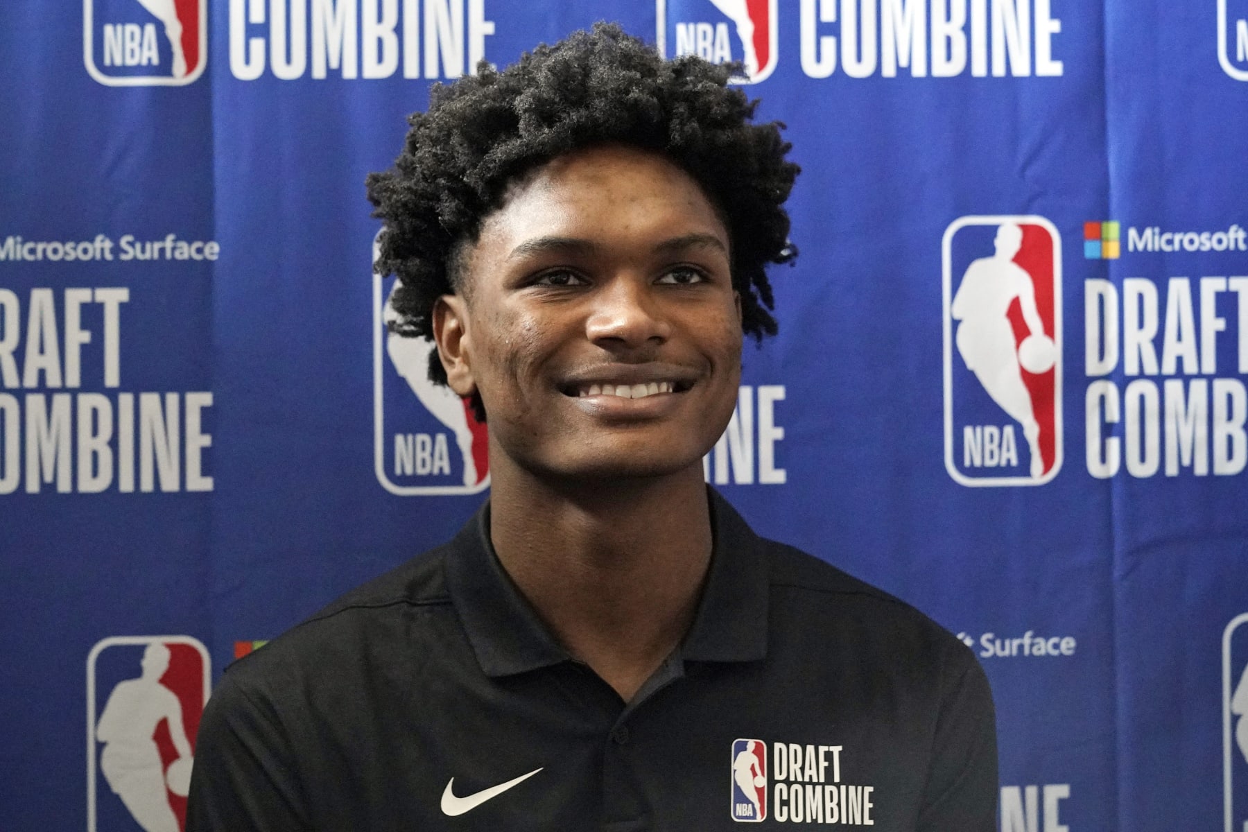 FILE - Amen Thompson smiles as he listens to a question from the media during the NBA basketball draft combine in Chicago, May 17, 2023. Thompson is among the top guards in the upcoming NBA draft. (AP Photo/Nam Y. Huh, File)