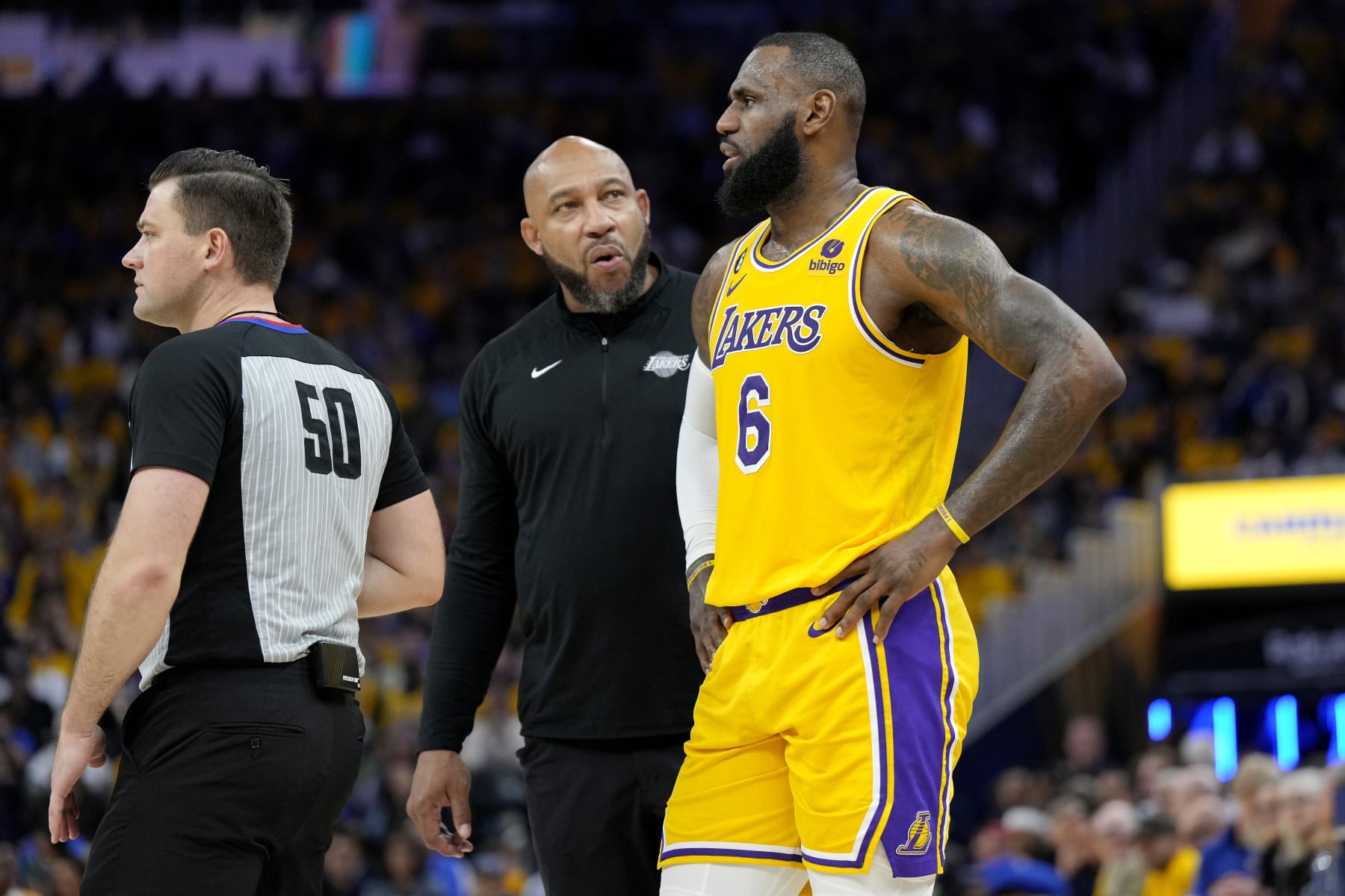 SAN FRANCISCO, CALIFORNIA - MAY 10: LeBron James #6 of the Los Angeles Lakers talks to Head coach Darvin Ham during the second quarter against the Golden State Warriors in game five of the Western Conference Semifinal Playoffs at Chase Center on May 10, 2023 in San Francisco, California. NOTE TO USER: User expressly acknowledges and agrees that, by downloading and or using this photograph, User is consenting to the terms and conditions of the Getty Images License Agreement. (Photo by Thearon W. Henderson/Getty Images)