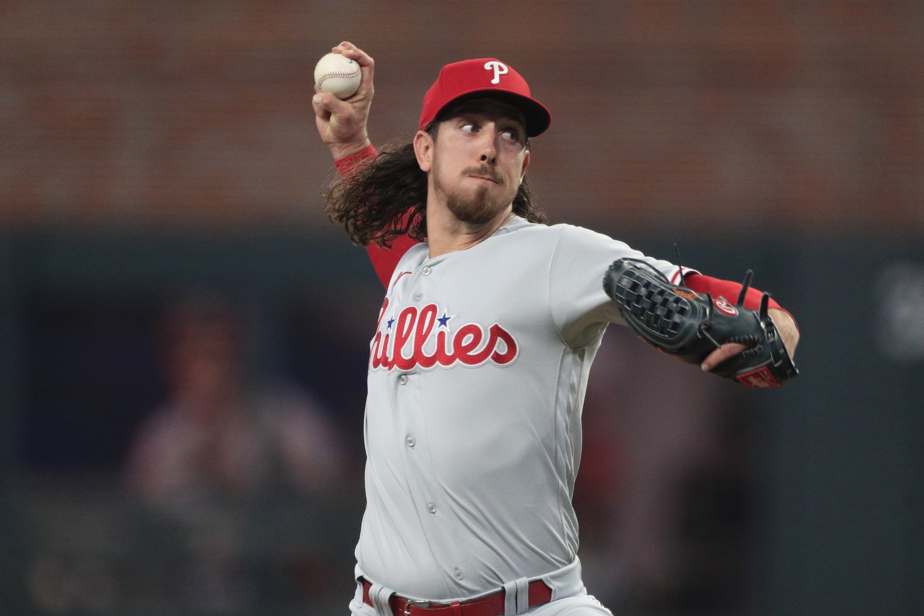 ATLANTA, GA - SEPTEMBER 19: Philadelphia Phillies relief pitcher Michael Lorenzen #22 delivers a pitch during the MLB game between the Philadelphia Phillies and the Atlanta Braves on September 19, 2023 at TRUIST Park in Atlanta, GA. (Photo by Jeff Robinson/Icon Sportswire via Getty Images)