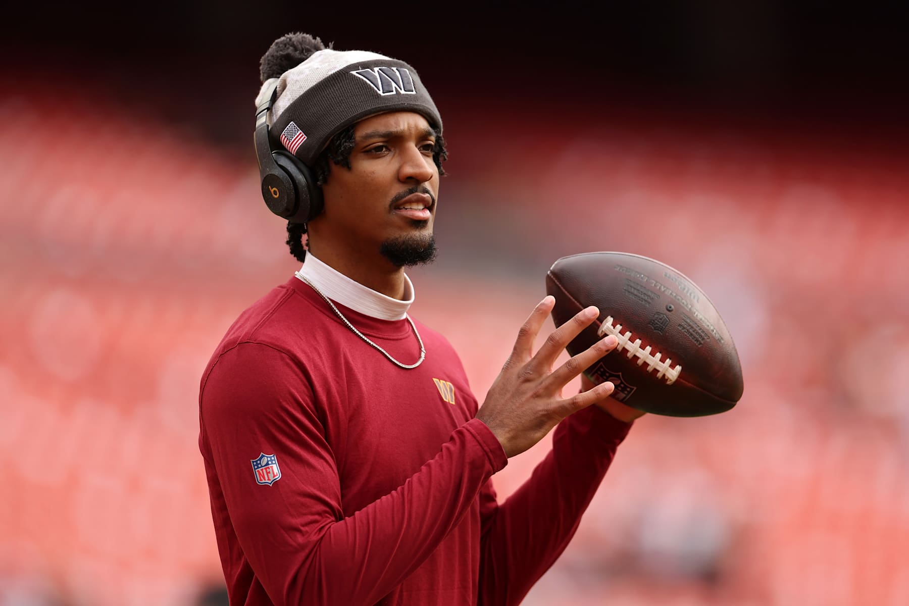 LANDOVER, MARYLAND - NOVEMBER 10: Jayden Daniels #5 of the Washington Commanders looks on prior to a game against the Pittsburgh Steelers at Northwest Stadium on November 10, 2024 in Landover, Maryland. (Photo by Scott Taetsch/Getty Images)