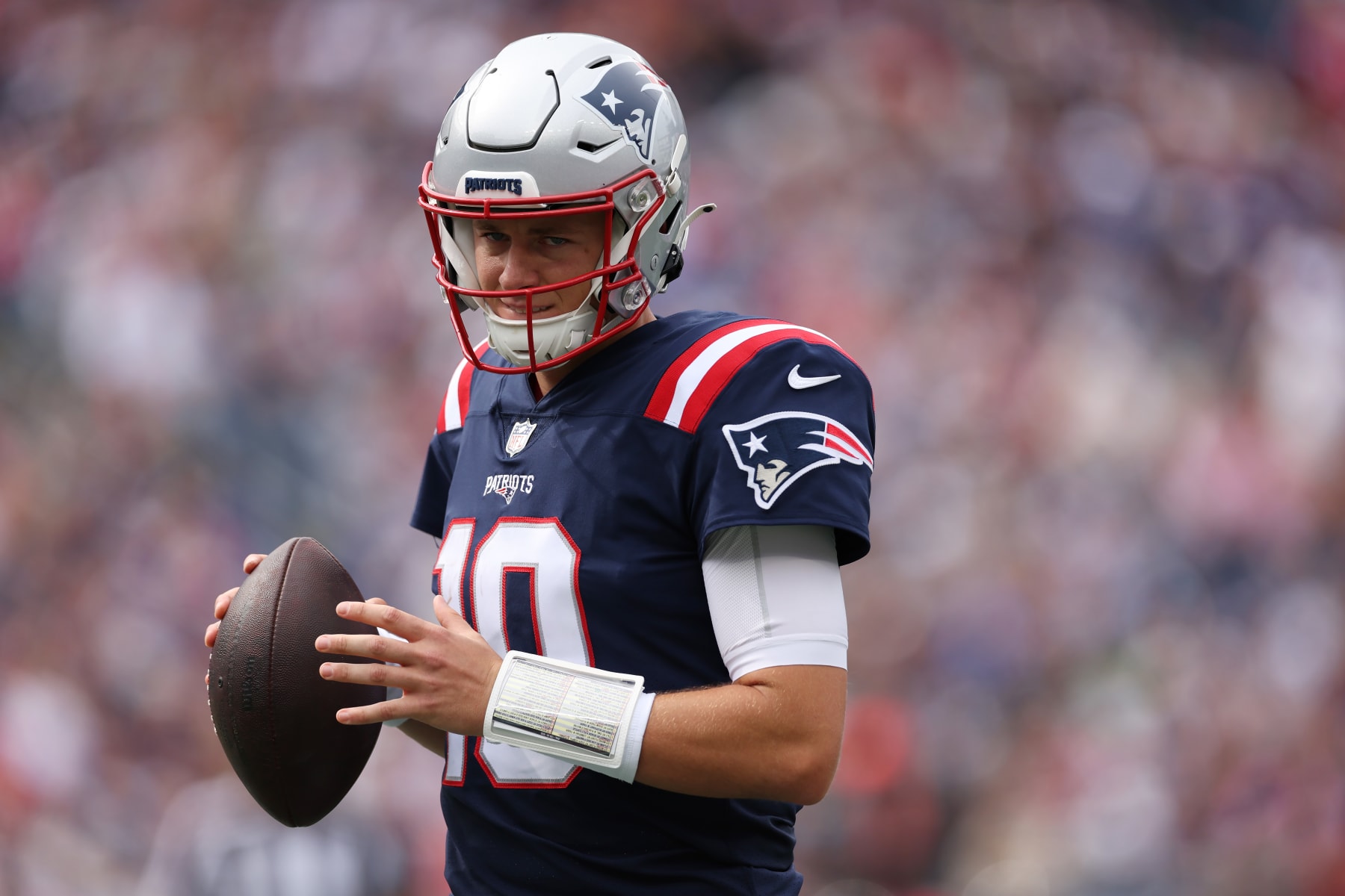 FOXBOROUGH, MASSACHUSETTS - SEPTEMBER 25: Mac Jones #10 of the New England Patriots looks on during the game against the Baltimore Ravens at Gillette Stadium on September 25, 2022 in Foxborough, Massachusetts. (Photo by Maddie Meyer/Getty Images)