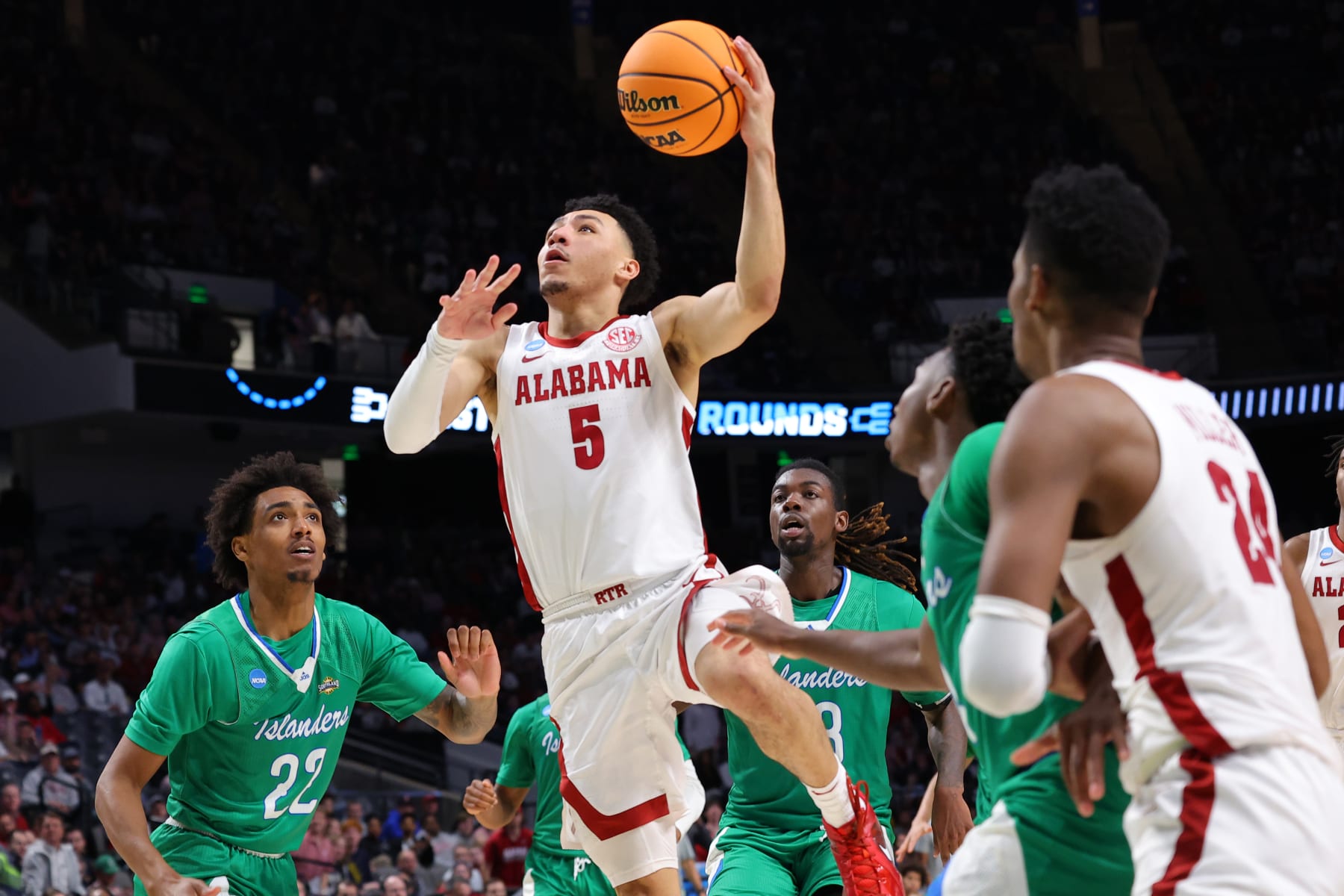 BIRMINGHAM, ALABAMA - MARCH 16: Jahvon Quinerly #5 of the Alabama Crimson Tide shoots the ball against Simeon Fryer #22 of the Texas A&M-CC Islanders during the second half in the first round of the NCAA Men's Basketball Tournament at Legacy Arena at the BJCC on March 16, 2023 in Birmingham, Alabama. (Photo by Kevin C. Cox/Getty Images)