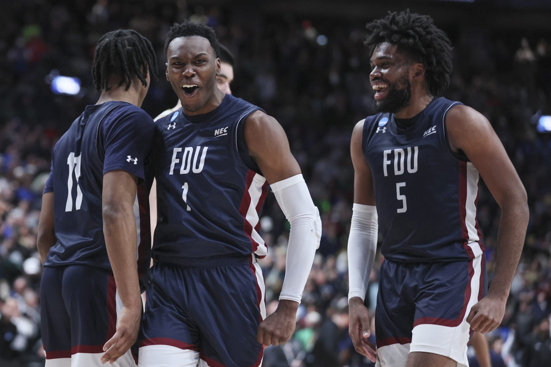 COLUMBUS, OHIO - MARCH 17: Joe Munden Jr. #1 of the Fairleigh Dickinson Knights reacts in the second half of a game against the Purdue Boilermakers in the first round of the NCAA Men's Basketball Tournament at Nationwide Arena on March 17, 2023 in Columbus, Ohio. (Photo by Andy Lyons/Getty Images)