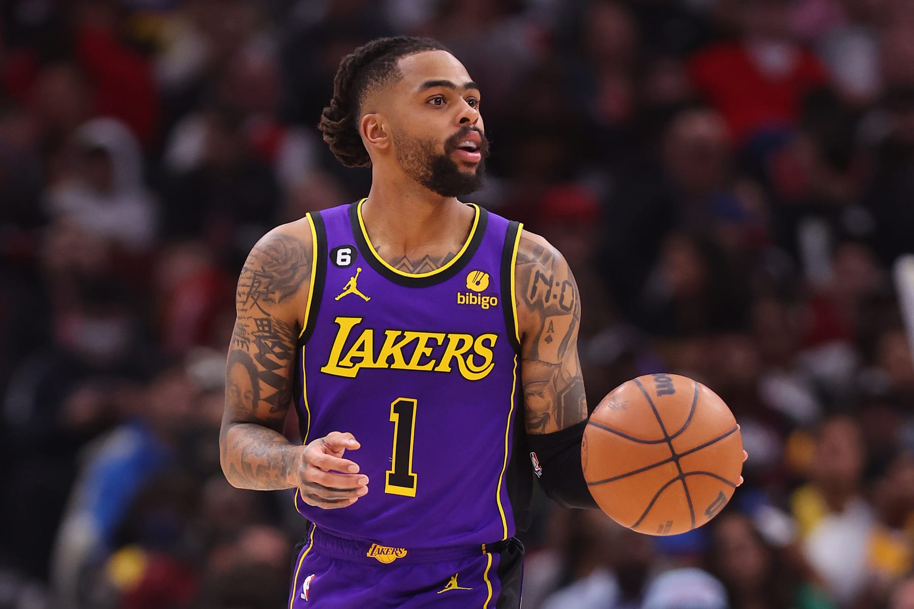 CHICAGO, ILLINOIS - MARCH 29: D'Angelo Russell #1 of the Los Angeles Lakers dribbles against the Chicago Bulls during the second half at United Center on March 29, 2023 in Chicago, Illinois. NOTE TO USER: User expressly acknowledges and agrees that, by downloading and or using this photograph, User is consenting to the terms and conditions of the Getty Images License Agreement. (Photo by Michael Reaves/Getty Images)