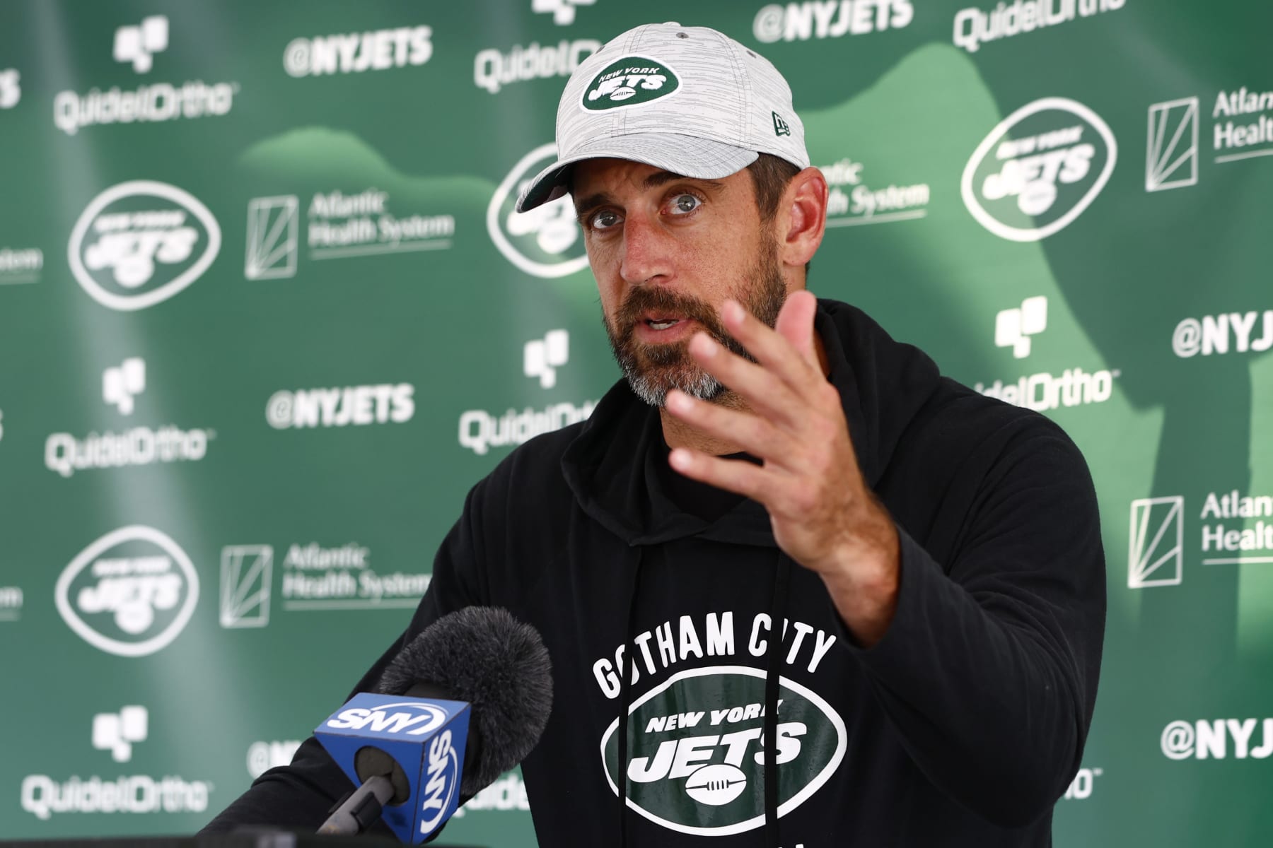 FLORHAM PARK, NEW JERSEY - JULY 26: Quarterback Aaron Rodgers #8 of the New York Jets talks to reporters after training camp at Atlantic Health Jets Training Center on July 26, 2023 in Florham Park, New Jersey. (Photo by Rich Schultz/Getty Images)
