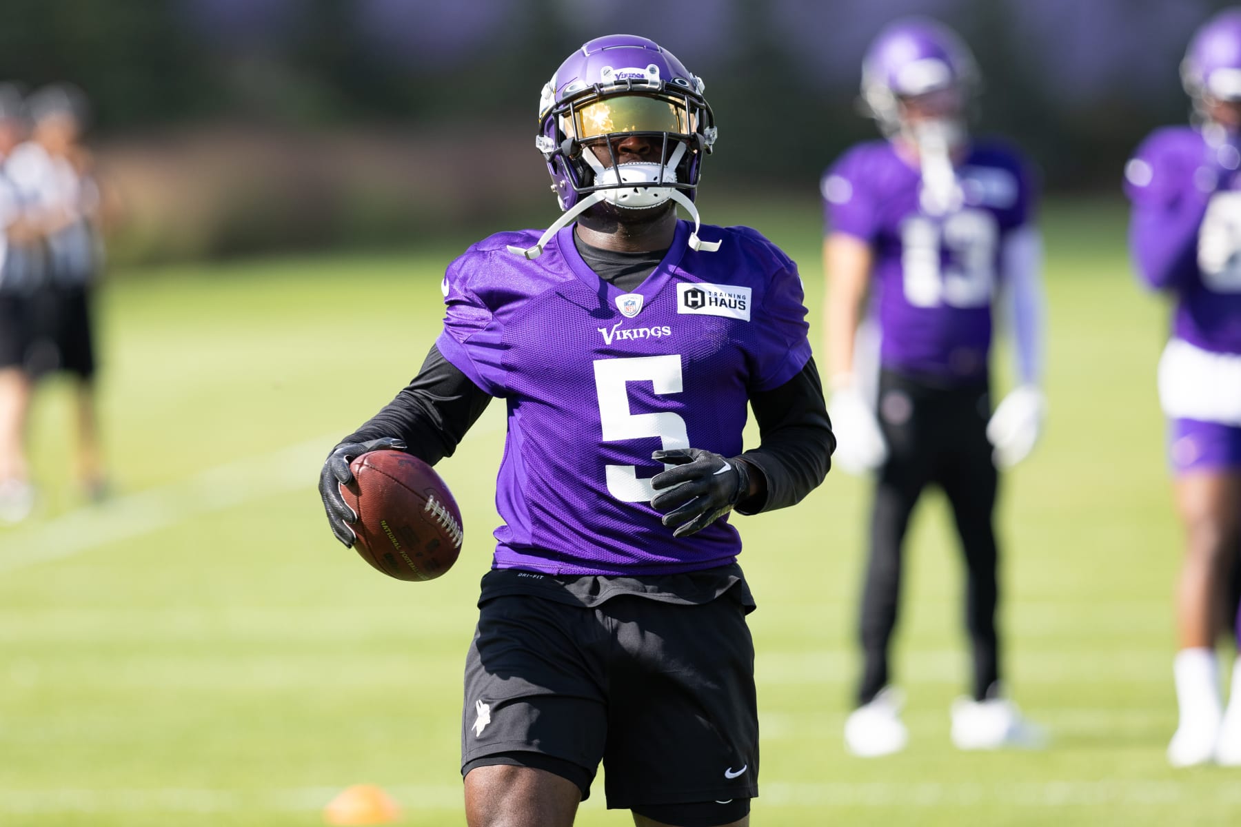 EAGAN, MN - AUGUST 12: Minnesota Vikings wide receiver Jalen Reagor (5) runs with the ball during Minnesota Vikings Training Camp at TCO Performance Center on August 12, 2023 in Eagan, Minnesota. (Photo by Bailey Hillesheim/Icon Sportswire via Getty Images)