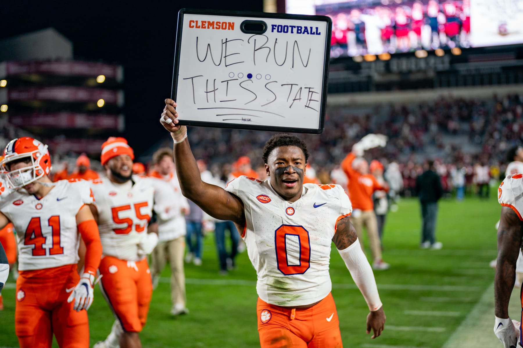 COLUMBIA, SOUTH CAROLINA - NOVEMBER 25: Barrett Carter #0 of the Clemson Tigers celebrates after defeating the South Carolina Gamecocks during their game at Williams-Brice Stadium on November 25, 2023 in Columbia, South Carolina. (Photo by Jacob Kupferman/Getty Images)