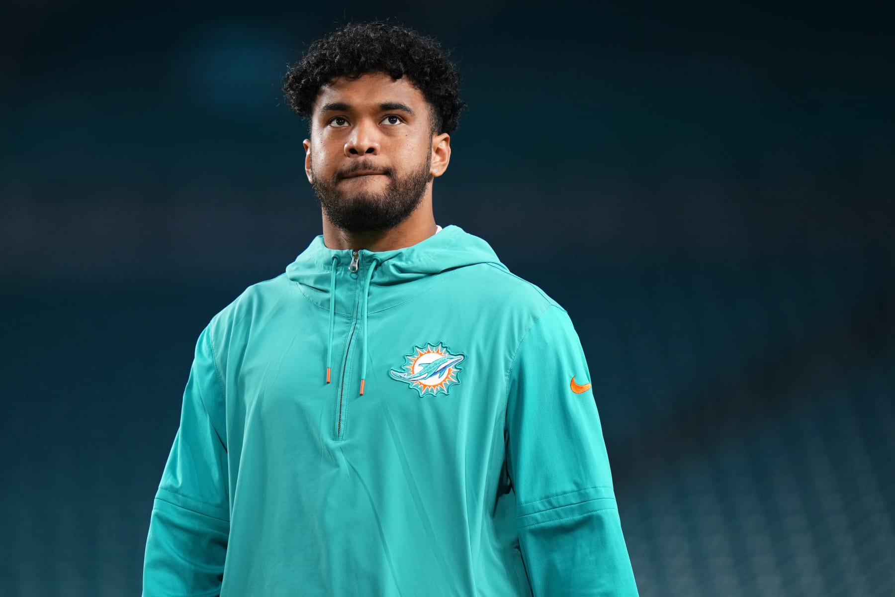 MIAMI GARDENS, FLORIDA - JANUARY 07: Tua Tagovailoa #1 of the Miami Dolphins warms up prior to a game against the Buffalo Bills at Hard Rock Stadium on January 07, 2024 in Miami Gardens, Florida. (Photo by Rich Storry/Getty Images)