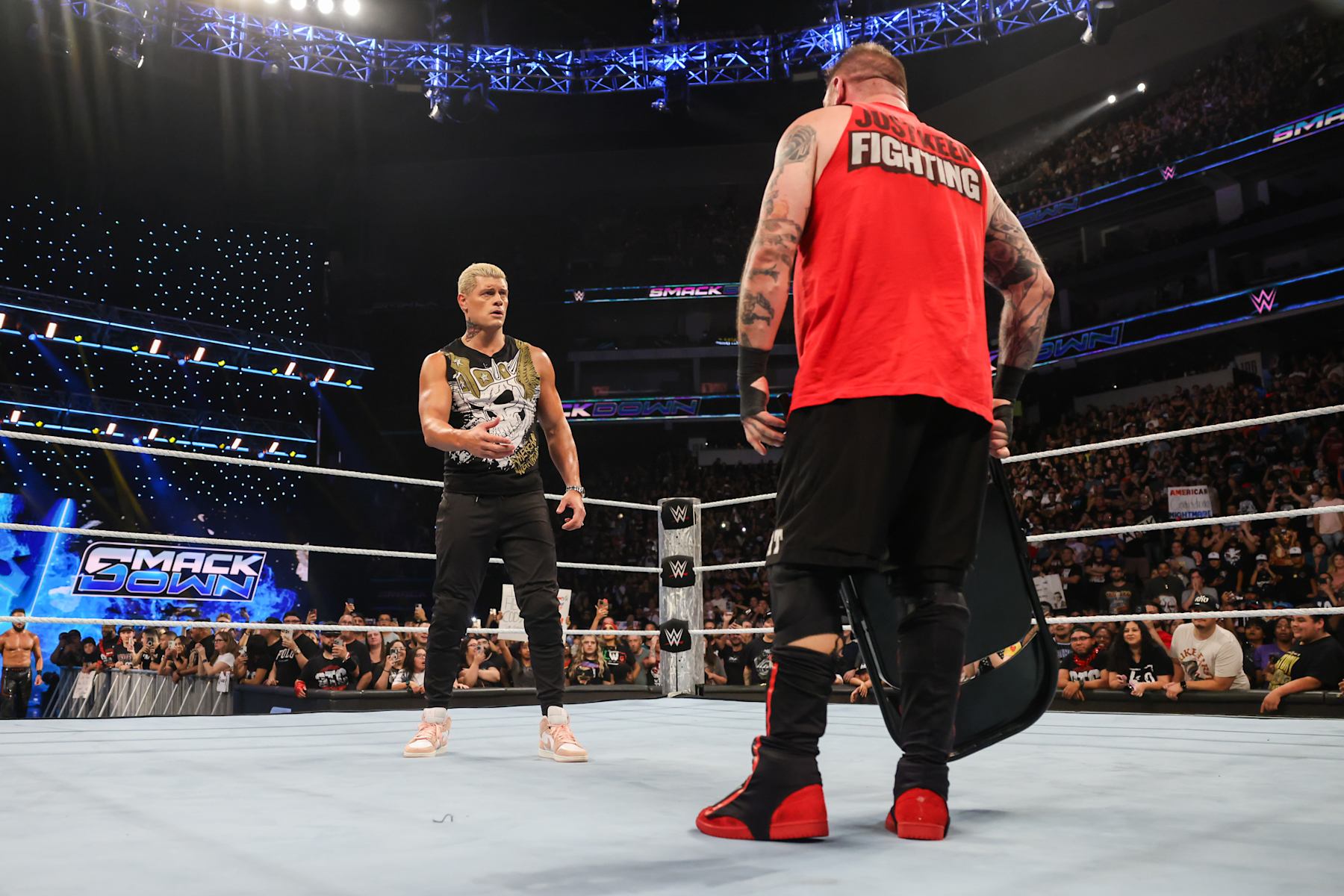 SACRAMENTO, CALIFORNIA - SEPTEMBER 20: Cody Rhodes and Kevin Owens standing in ring during WWE SmackDown at Golden 1 Center on September 20, 2024 in Sacramento, California.  (Photo by WWE/Getty Images)