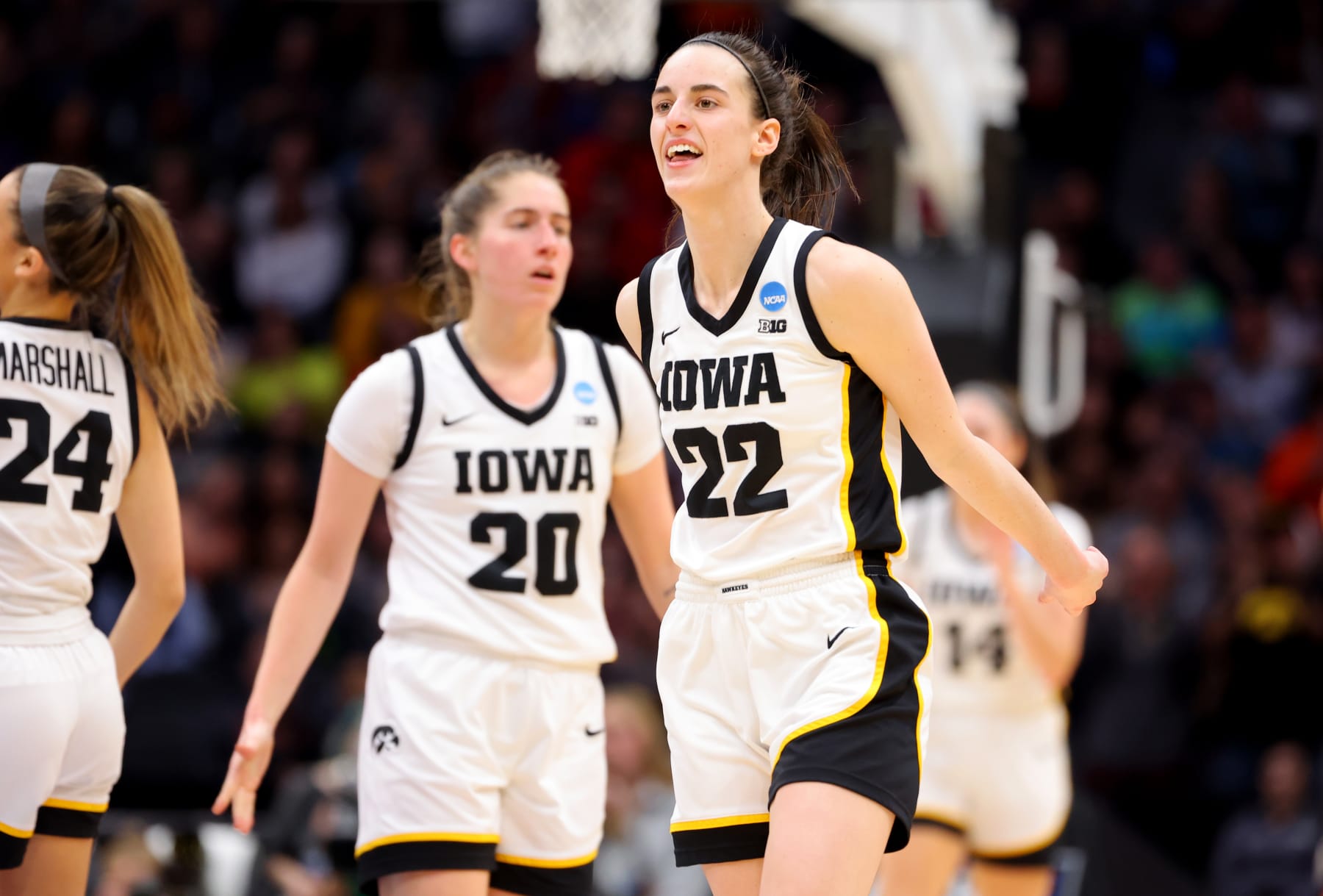 SEATTLE, WA - MARCH 26: Caitlin Clark #22 of the Iowa Hawkeyes reacts against the Louisville Cardinals in the second half of the game during the Elite Eight round of the 2023 NCAA Women's Basketball Tournament held at Climate Pledge Arena on March 26, 2023 in Seattle, Washington. (Photo by C. Morgan Engel/NCAA Photos via Getty Images)