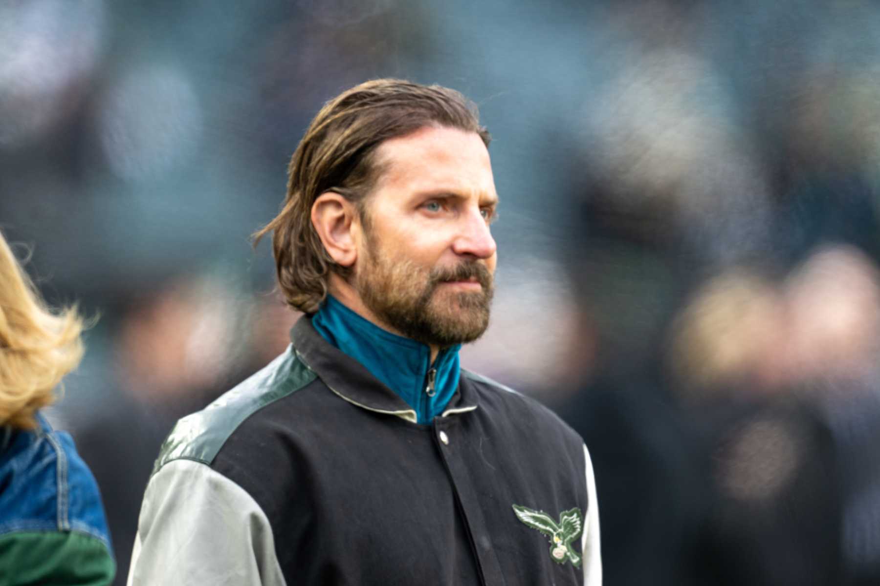 PHILADELPHIA, PA - JANUARY 19: Hollywood star Bradley Cooper watches practice before the NFC Divisional Playoff game between the Philadelphia Eagles and the Los Angeles Rams on January 19th, 2025 at Lincoln Financial Field in Philadelphia, PA. (Photo by Terence Lewis/Icon Sportswire via Getty Images)