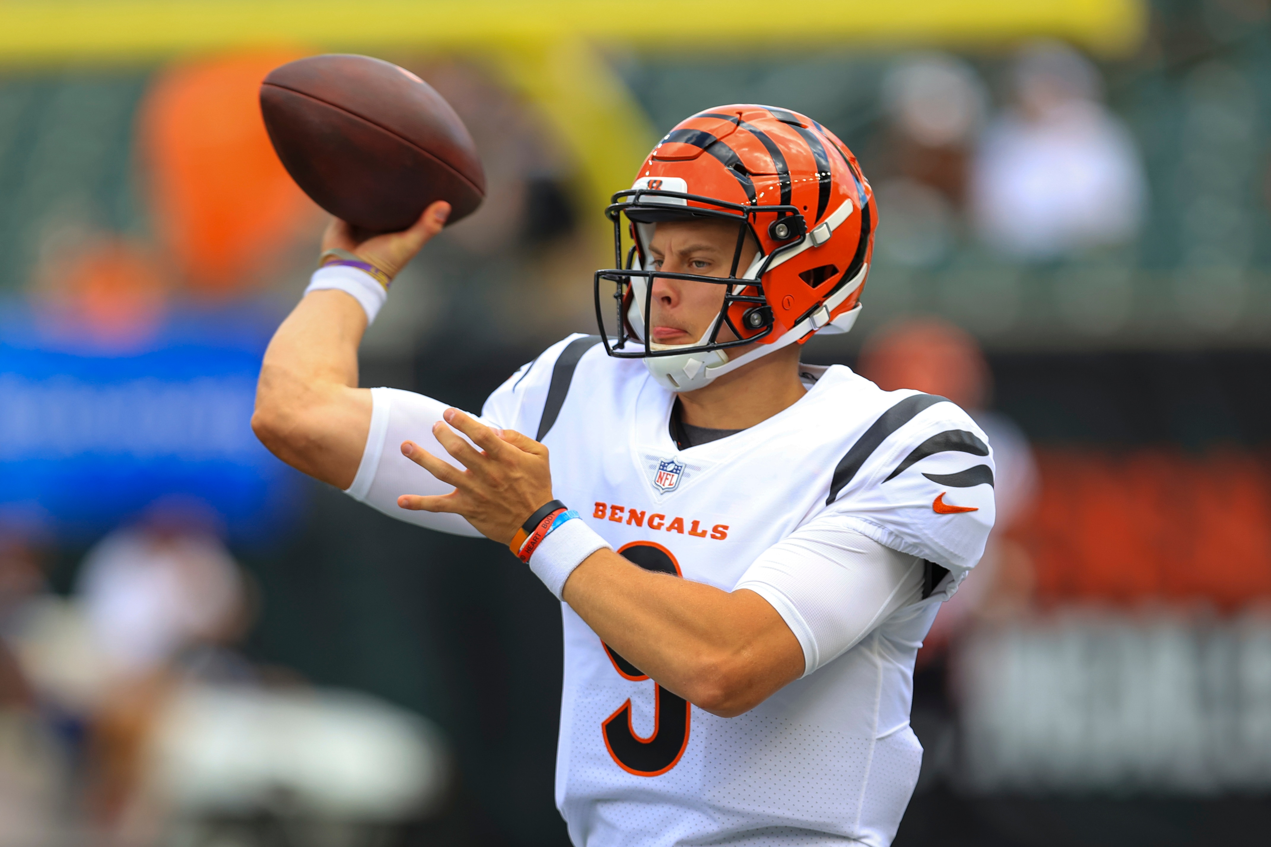 Cincinnati Bengals quarterback Joe Burrow (9) throws before an NFL exhibition football game against the Miami Dolphins in Cincinnati, Sunday, Aug. 29, 2021. (AP Photo/Aaron Doster)