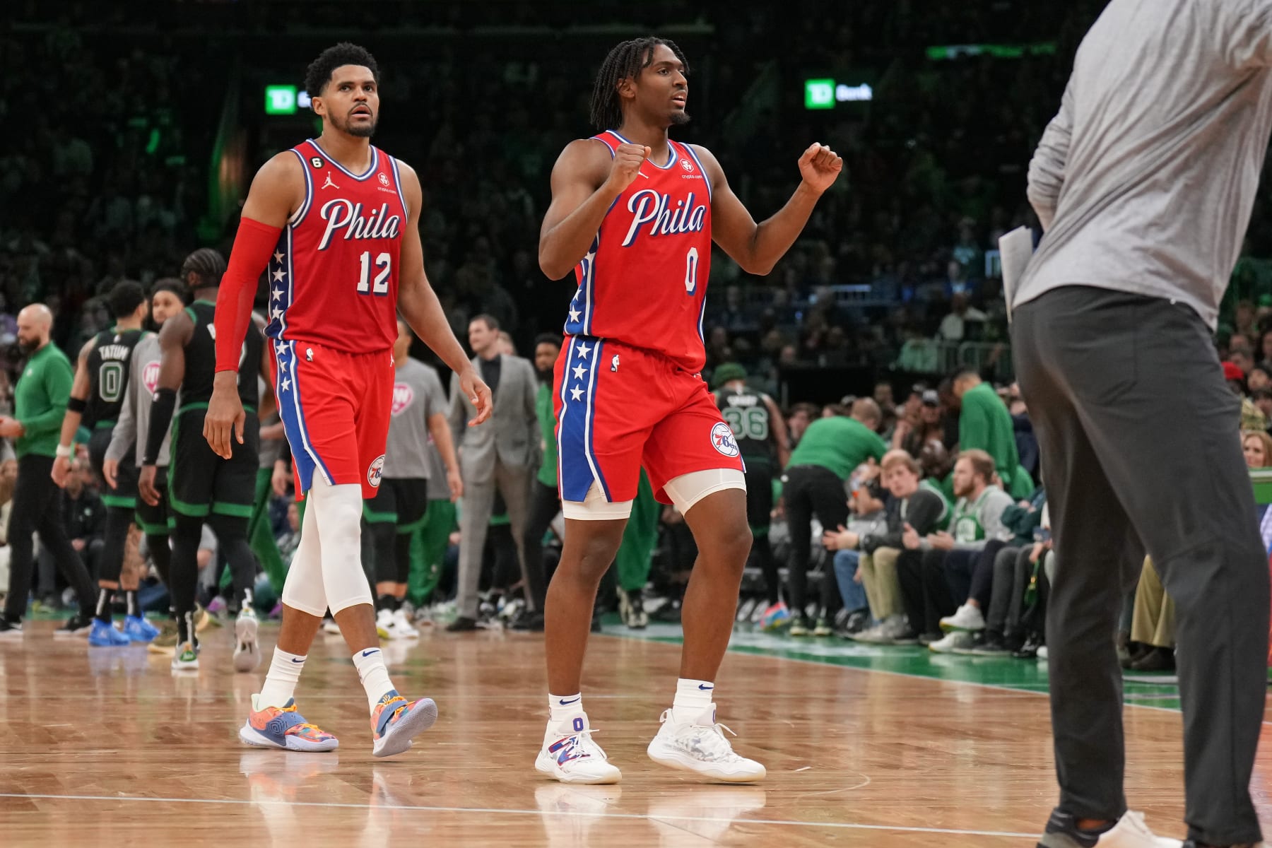 BOSTON, MA - MAY 1: Tyrese Maxey #0 and Tobias Harris #12 of the Philadelphia 76ers react during Game 1 of the Western Conference semifinals 2023 NBA Playoffs against the Boston Celtics on May 1, 2023 at the TD Garden in Boston, Massachusetts. NOTE TO USER: User expressly acknowledges and agrees that, by downloading and or using this photograph, User is consenting to the terms and conditions of the Getty Images License Agreement. Mandatory Copyright Notice: Copyright 2023 NBAE  (Photo by Jesse D. Garrabrant/NBAE via Getty Images)
