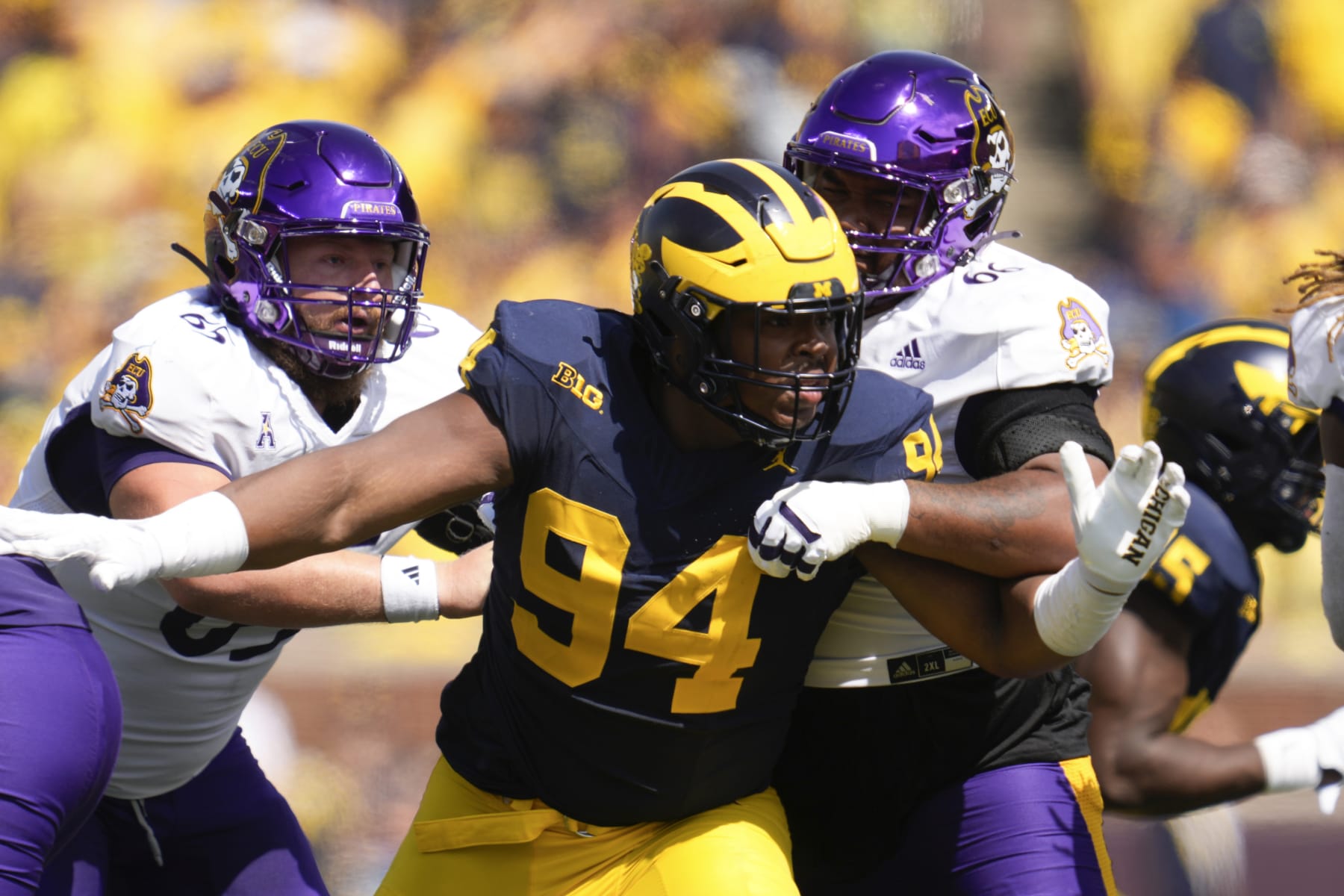 Michigan defensive lineman Kris Jenkins (94) applies pressure against East Carolina in the first half of an NCAA college football game in Ann Arbor, Mich., Saturday, Sept. 2, 2023. (AP Photo/Paul Sancya)