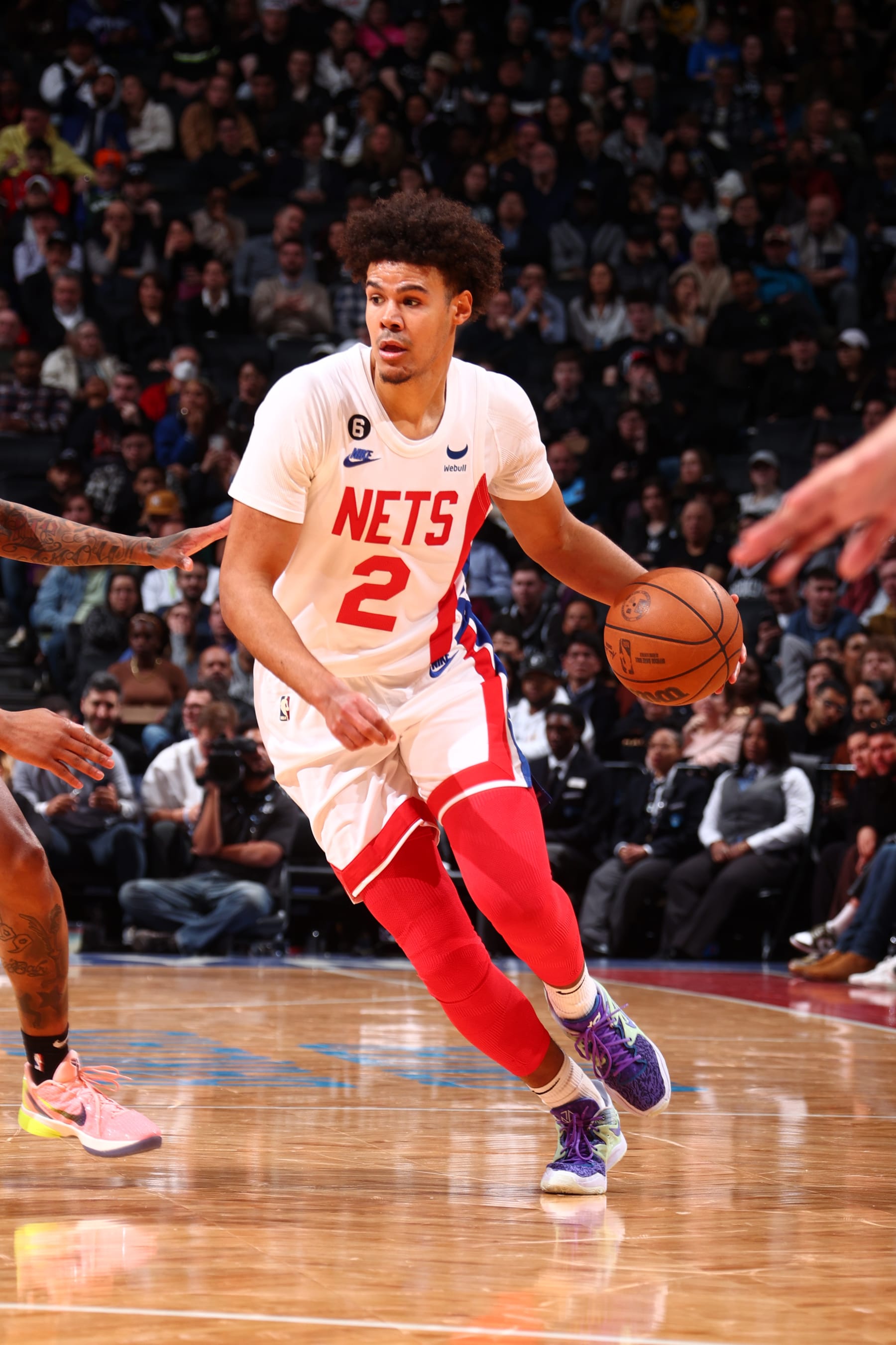 BROOKLYN, NY - MARCH 16: Cameron Johnson #2 of the Brooklyn Nets dribbles the ball during the game against the Sacramento Kings on March 16, 2023 at Barclays Center in Brooklyn, New York. NOTE TO USER: User expressly acknowledges and agrees that, by downloading and or using this Photograph, user is consenting to the terms and conditions of the Getty Images License Agreement. Mandatory Copyright Notice: Copyright 2023 NBAE (Photo by Nathaniel S. Butler/NBAE via Getty Images)