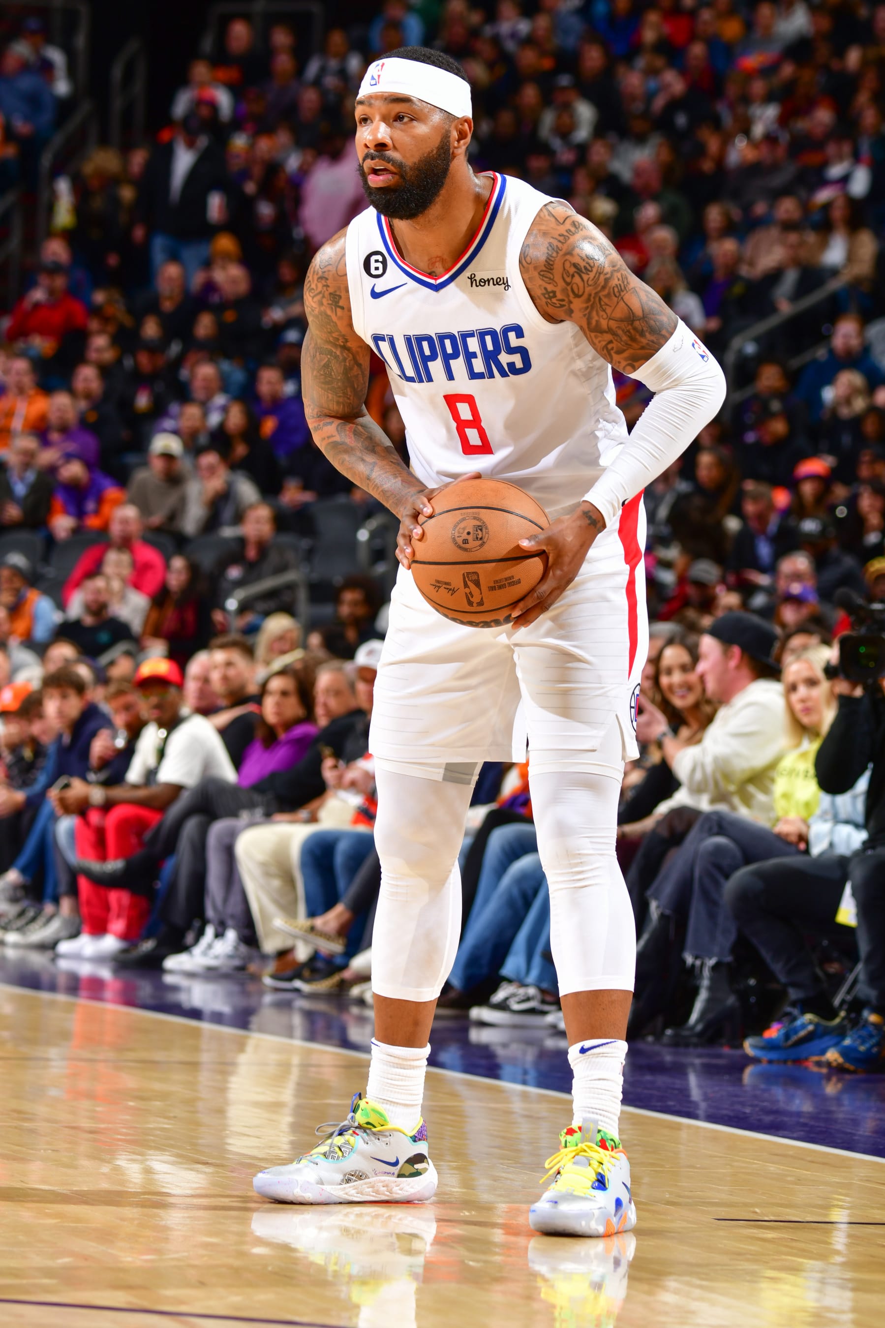 PHOENIX, AZ - FEBUARY 16:  Marcus Morris Sr. #8 of the LA Clippers handles the ball during the game  on Febuary 16, 2023 at Footprint Center in Phoenix, Arizona. NOTE TO USER: User expressly acknowledges and agrees that, by downloading and or using this photograph, user is consenting to the terms and conditions of the Getty Images License Agreement. Mandatory Copyright Notice: Copyright 2023 NBAE (Photo by Barry Gossage/NBAE via Getty Images)