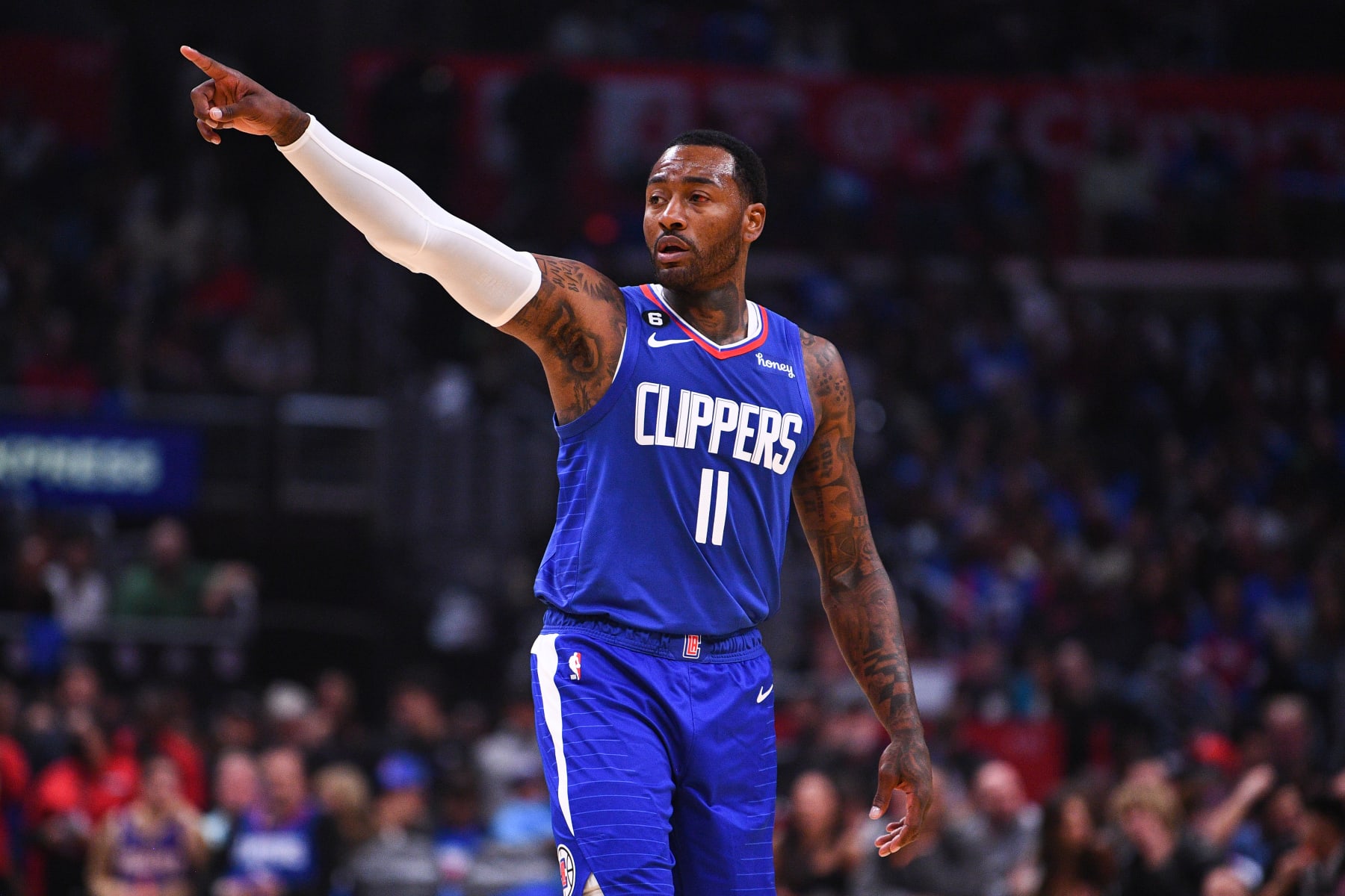 LOS ANGELES, CA - OCTOBER 23: Los Angeles Clippers guard John Wall (11) shouts out instructions during a NBA game between the Phoenix Suns and the Los Angeles Clippers on October 23, 2022 at Crypto.com Arena in Los Angeles, CA. (Photo by Brian Rothmuller/Icon Sportswire via Getty Images)