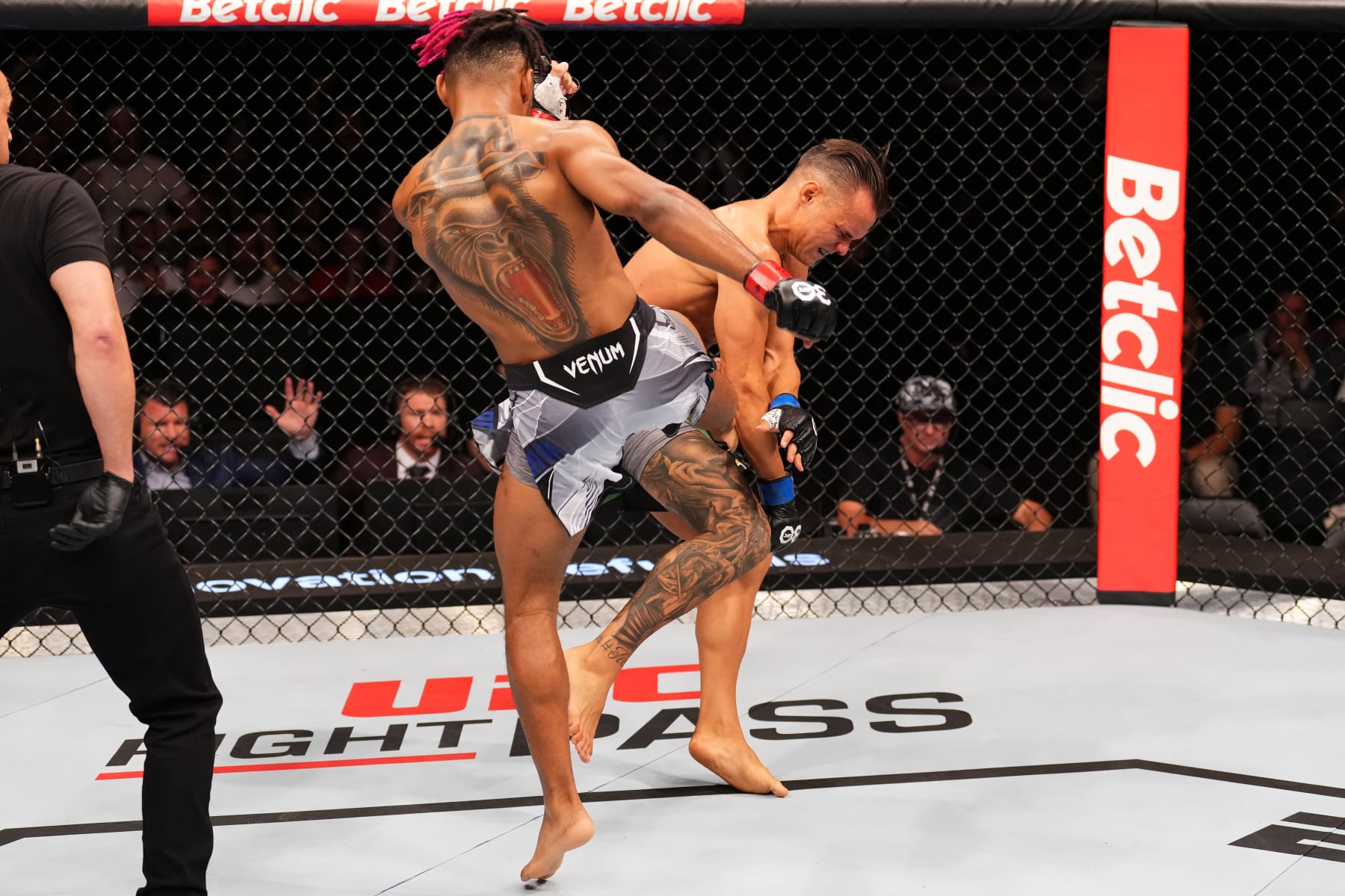 PARIS, FRANCE - SEPTEMBER 02: (L-R) Morgan Charriere of France kicks the body of Manolo Zecchini of Italy in a featherweight fight during the UFC Fight Night event at The Accor Arena on September 02, 2023 in Paris, France. (Photo by Josh Hedges/Zuffa LLC via Getty Images)