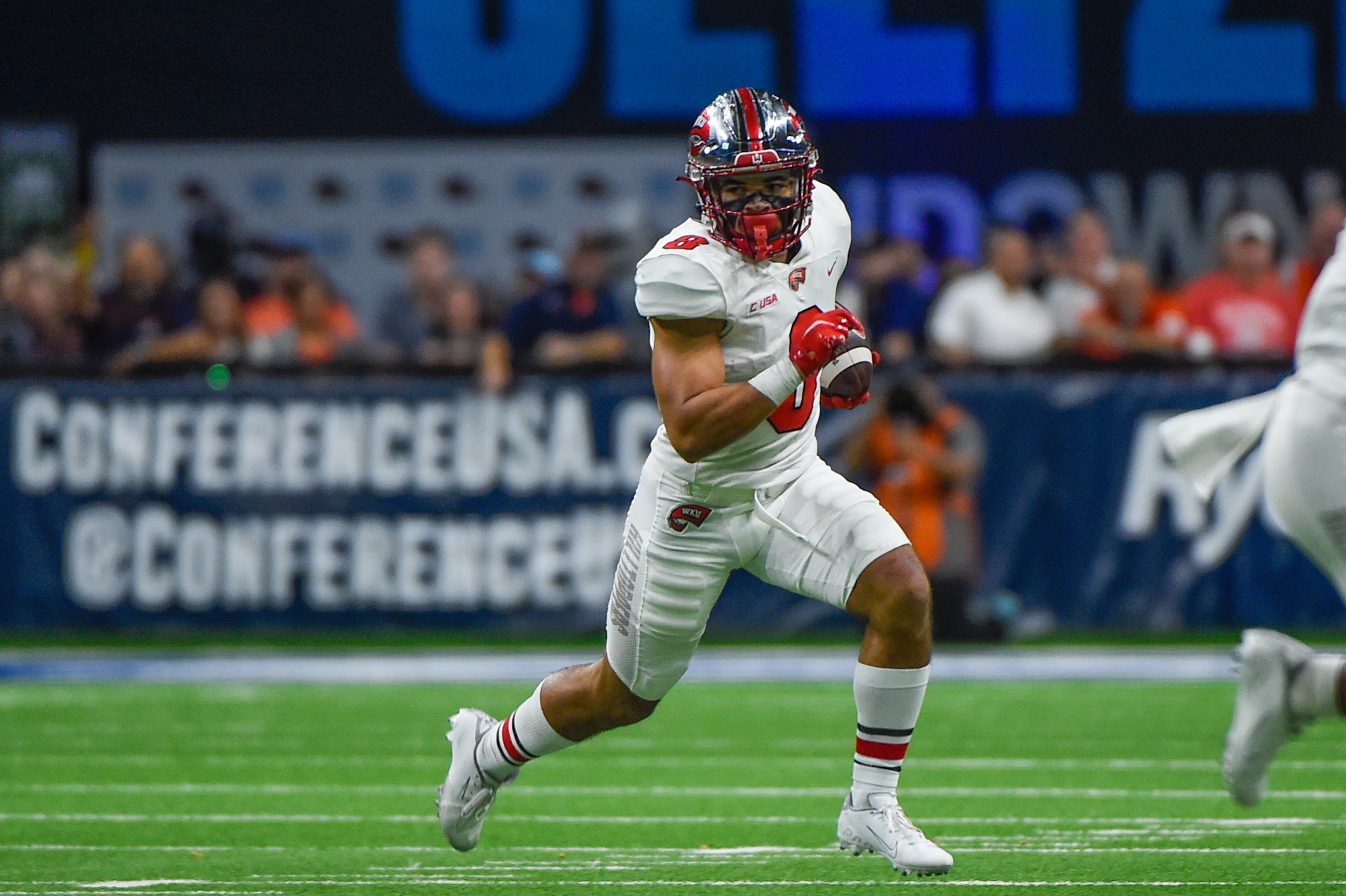 SAN ANTONIO, TX - DECEMBER 03: Western Kentucky Hilltoppers wide receiver Jerreth Sterns (8) looks for running room to his left during the football game between the Western Kentucky Hilltoppers and UTSA Roadrunners at the Alamodome on December 3, 2021 in San Antonio, Texas. (Photo by Ken Murray/Icon Sportswire via Getty Images)