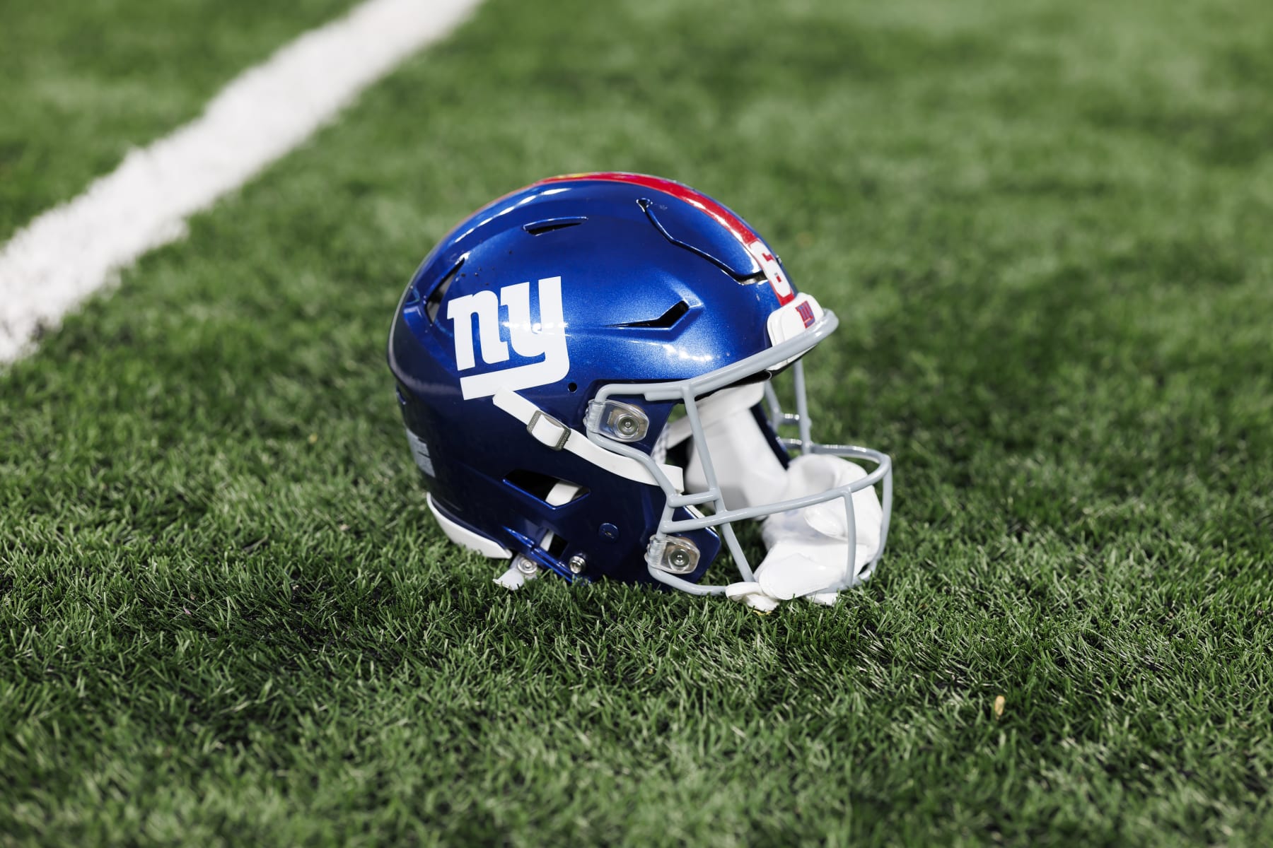 EAST RUTHERFORD, NEW JERSEY - SEPTEMBER 10: A detail view of a New York Giants helmet during pregame warmups prior to an NFL football game against the Dallas Cowboys at MetLife Stadium on September 10, 2023 in East Rutherford, New Jersey. (Photo by Ryan Kang/Getty Images)