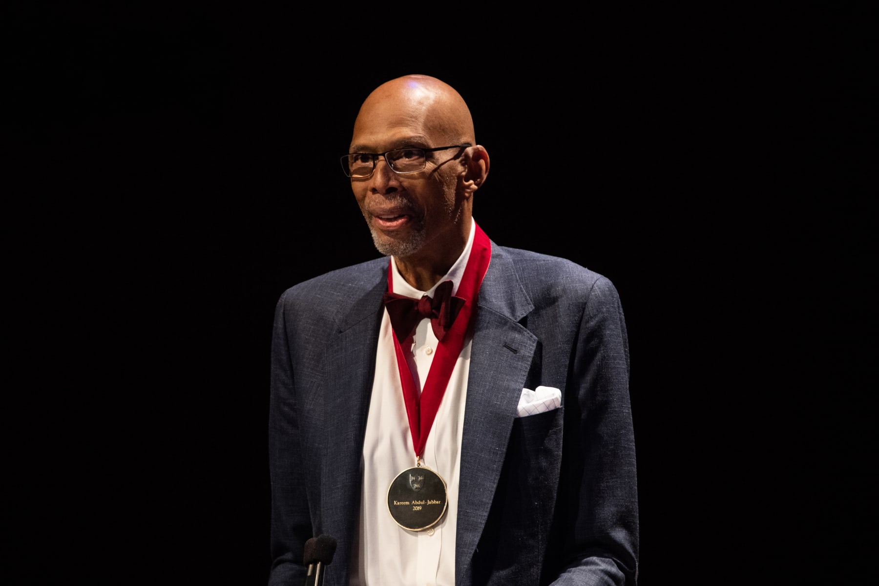 CAMBRIDGE, MA - OCTOBER 06: National Basketball Association (NBA) legend Kareem Abdul-Jabbar speaks to the audience after receiving his medal during the Harvard University Hutchins Center Honors W.E.B. Du Bois Medal Ceremony on October 6, 2022, at Sanders Theatre in Cambridge, MA. (Photo by Erica Denhoff/Icon Sportswire via Getty Images)