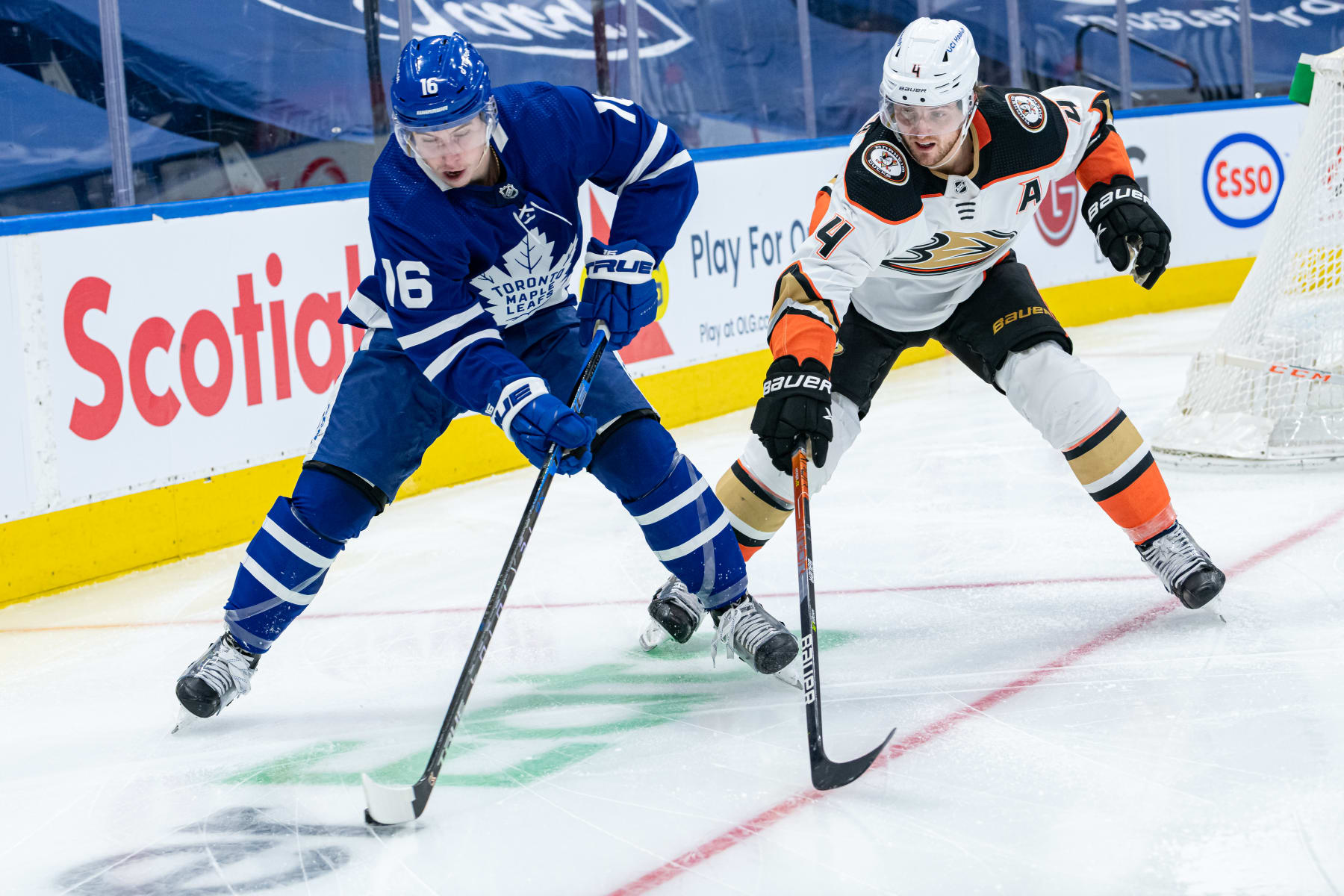 TORONTO, ON - JANUARY 26: Anaheim Ducks Defenceman Cam Fowler (4) defends Toronto Maple Leafs Right Wing Mitchell Marner (16) during the NHL regular season game between the Anaheim Ducks and the Toronto Maple Leafs on January 26, 2022, at Scotiabank Arena in Toronto, ON, Canada. (Photo by Julian Avram/Icon Sportswire via Getty Images)