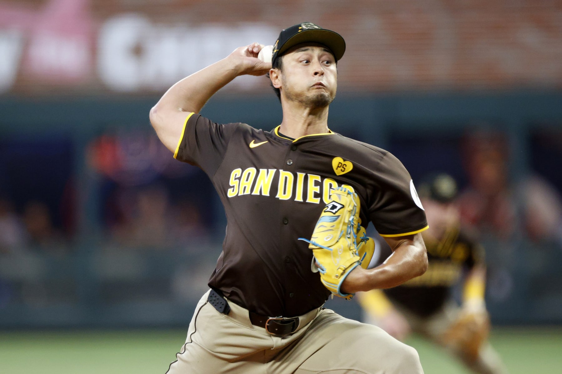 ATLANTA, GA - MAY 19: San Diego Padres starting pitcher Yu Darvish #11 delivers a pitch during the MLB game between the San Diego Padres and the Atlanta Braves on May 19, 2024 at TRUIST Park in Atlanta, GA. (Photo by Jeff Robinson/Icon Sportswire via Getty Images)