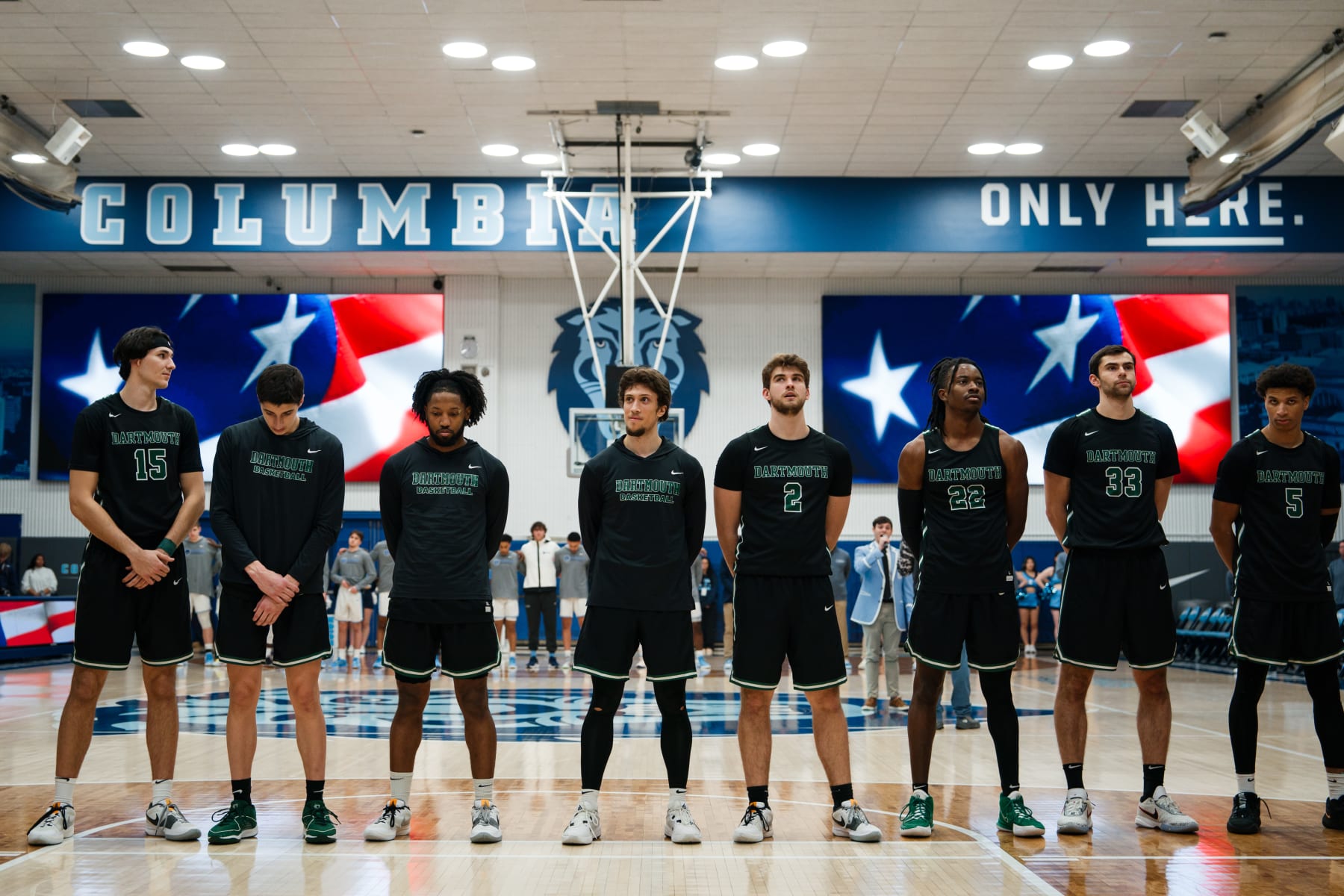 NEW YORK, NEW YORK - FEBRUARY 16: Romeo Myrthil #20 (4th-L), Cade Haskins #2 (5th-L) and teammates of the Dartmouth Big Green line up before their game against Columbia Lions in their NCAA men's basketball game on February 16, 2024 in New York City. After last week's National Labor Relations Board ruling that Dartmouth's men's basketball players are employees of the school, the team members will vote next month on whether to create the first labor union for NCAA athletes. (Photo by Adam Gray/Getty Images)