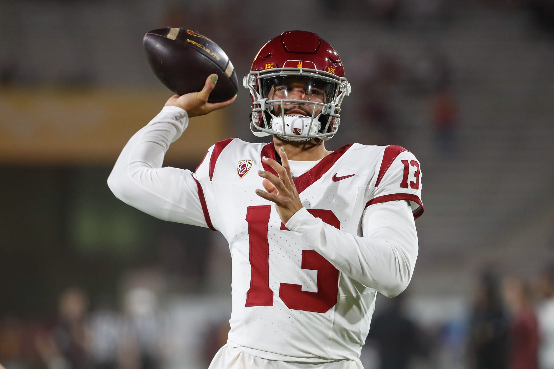 TEMPE, AZ - SEPTEMBER 23:  USC Trojans quarterback Caleb Williams (13) warms up before the college football game between the USC Trojans and the Arizona State Sun Devils on September 23, 2023 at Mountain America Stadium in Tempe, Arizona. (Photo by Kevin Abele/Icon Sportswire via Getty Images)