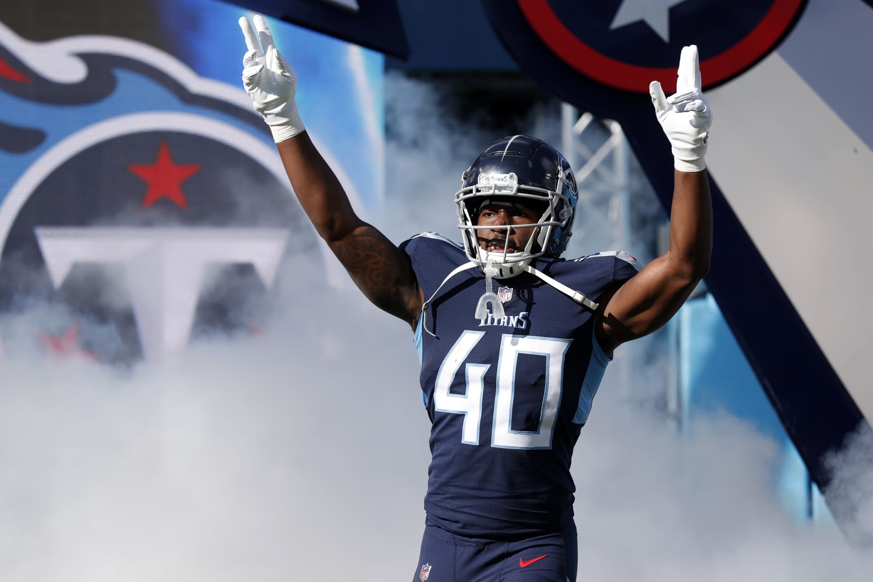 NASHVILLE, TENNESSEE - DECEMBER 12: Dontrell Hilliard #40 of the Tennessee Titans reacts as he is introduced prior to the game against the Jacksonville Jaguars at Nissan Stadium on December 12, 2021 in Nashville, Tennessee. (Photo by Wesley Hitt/Getty Images) NASHVILLE, TENNESSEE - DECEMBER 12: Dontrell Hilliard #40 of the Tennessee Titans reacts as he is introduced prior to the game against the Jacksonville Jaguars at Nissan Stadium on December 12, 2021 in Nashville, Tennessee. (Photo by Wesley Hitt/Getty Images)
