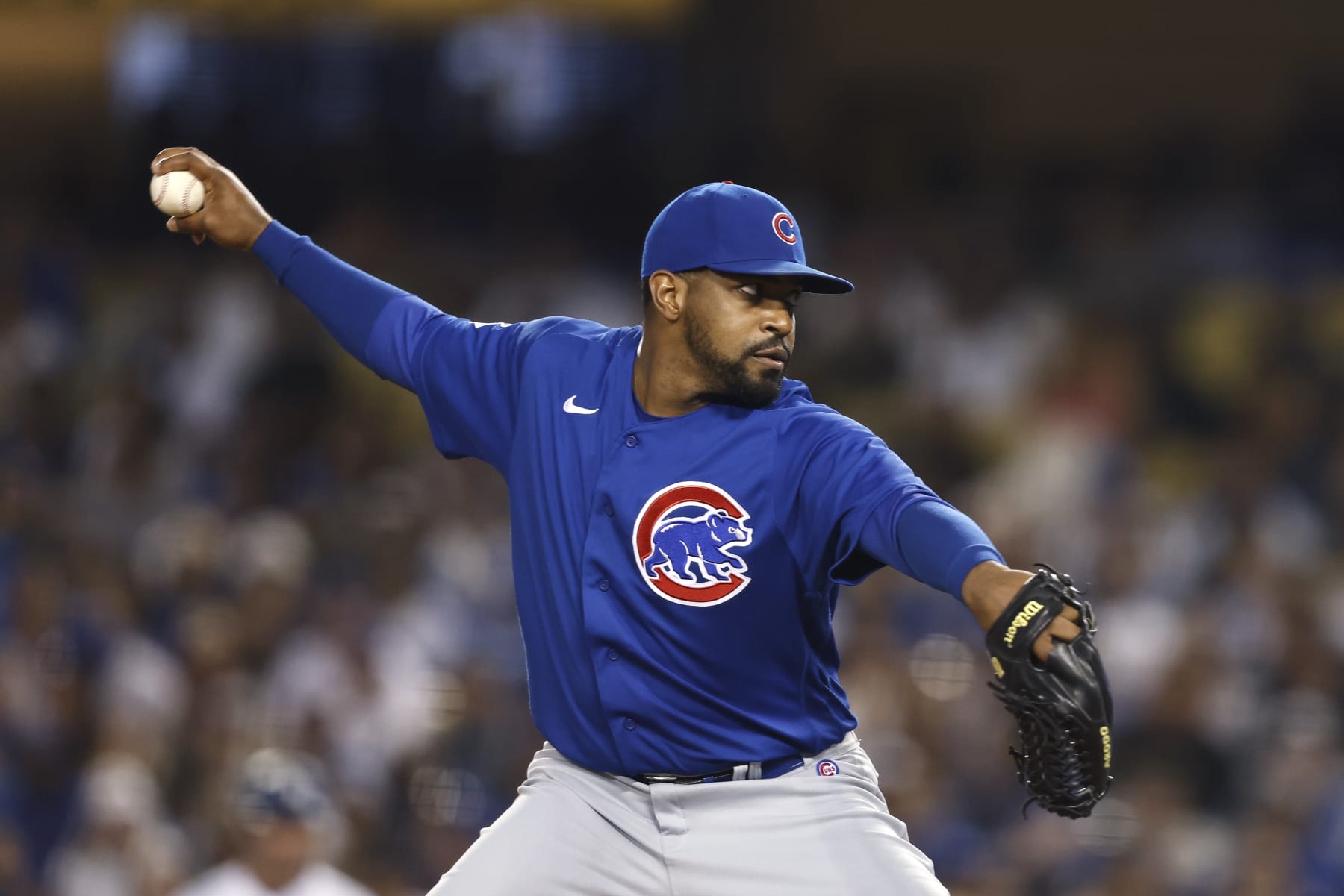 LOS ANGELES, CALIFORNIA - JULY 08: Mychal Givens #60 of the Chicago Cubs pitches against the Los Angeles Dodgers during the eighth inning at Dodger Stadium on July 08, 2022 in Los Angeles, California. (Photo by Michael Owens/Getty Images)