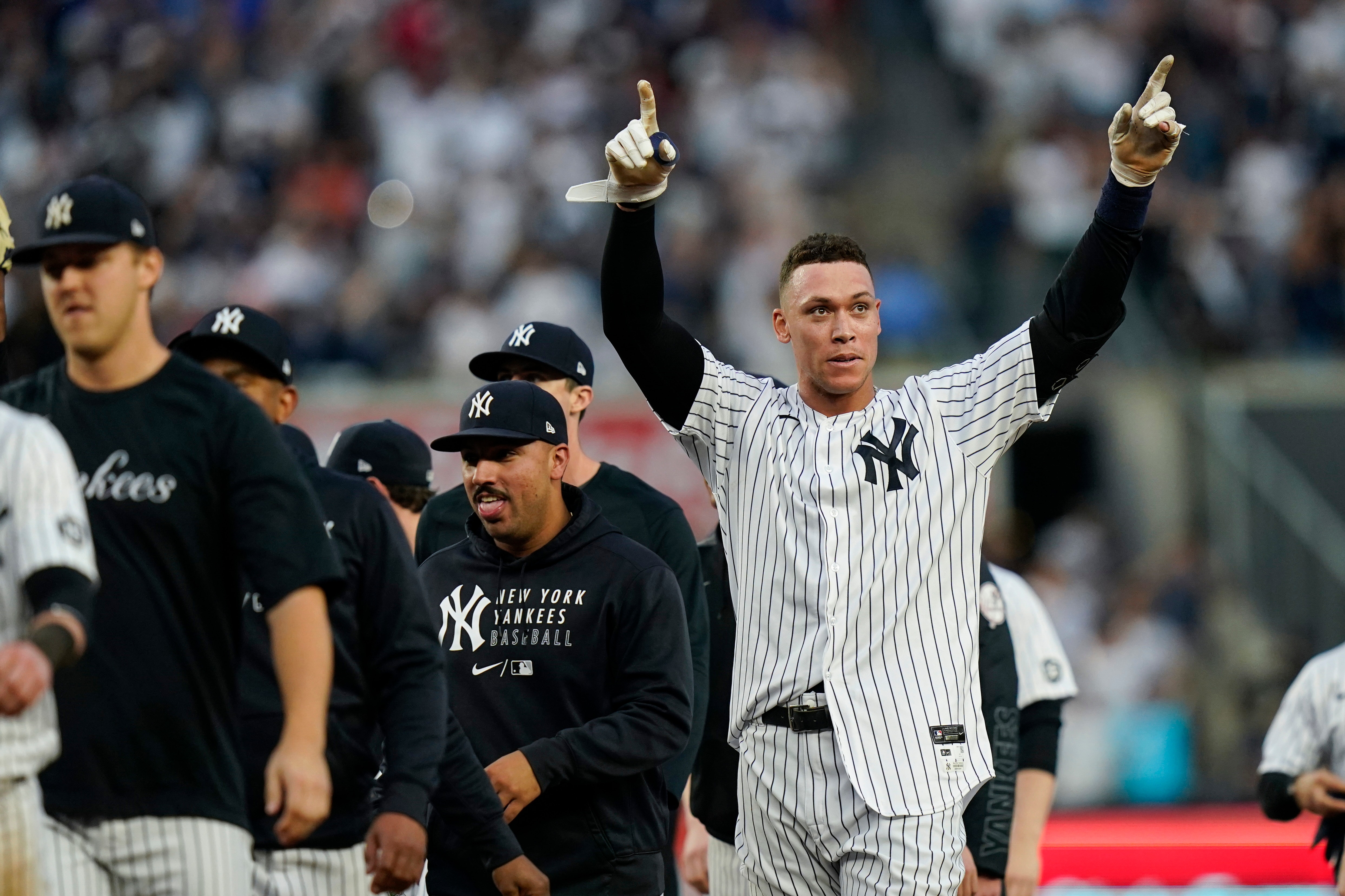 New York Yankees' Aaron Judge, right, gestures to fans after a baseball game against the Tampa Bay Rays Sunday, Oct. 3, 2021, in New York. The Yankees won 1-0. (AP Photo/Frank Franklin II)