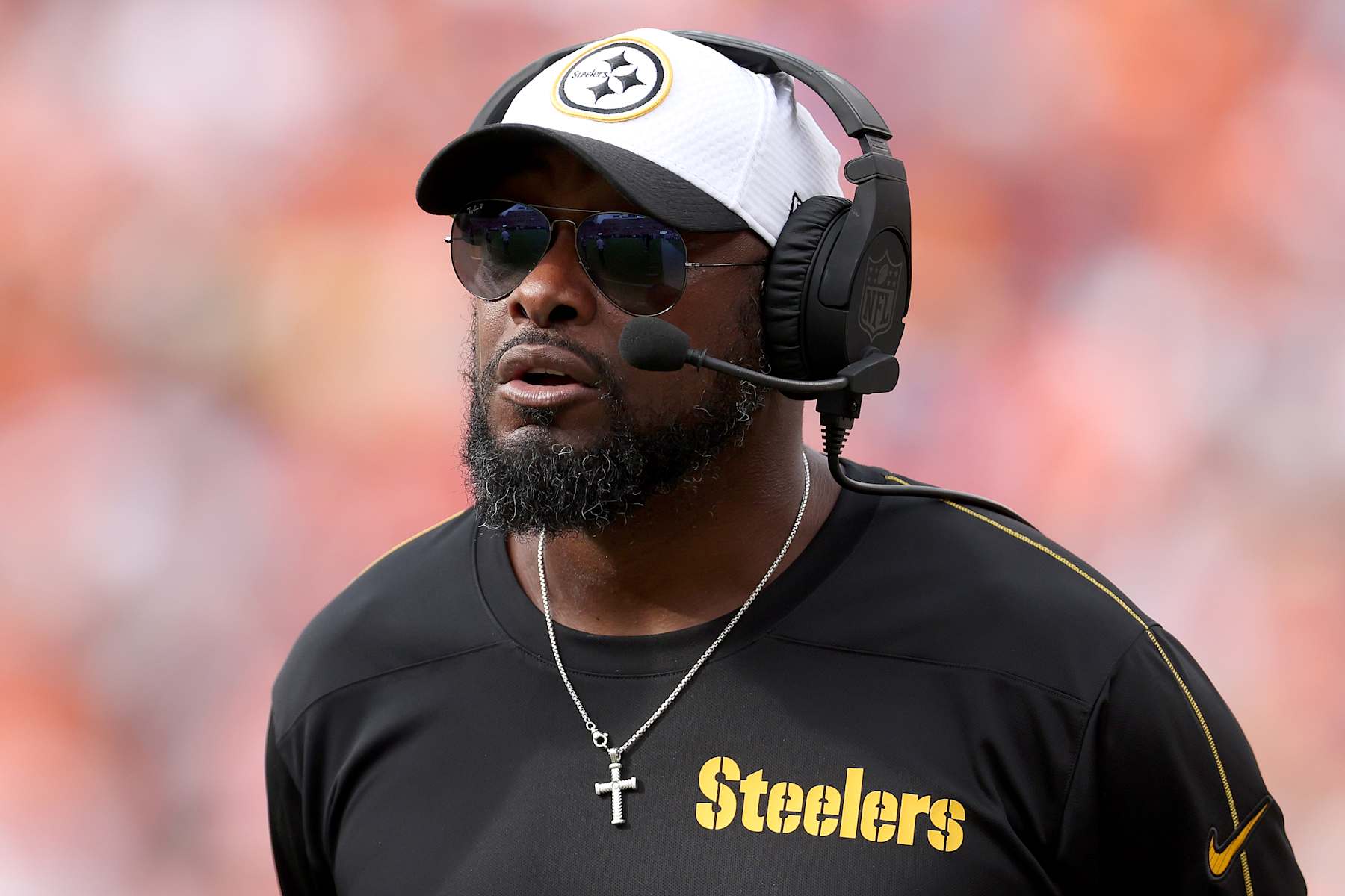 DENVER, COLORADO - SEPTEMBER 15: Head coach Mike Tomlin of the Pittsburgh Steelers watches as his team plays the Denver Broncos in the second quarter at Empower Field At Mile High on September 15, 2024 in Denver, Colorado. (Photo by Matthew Stockman/Getty Images)