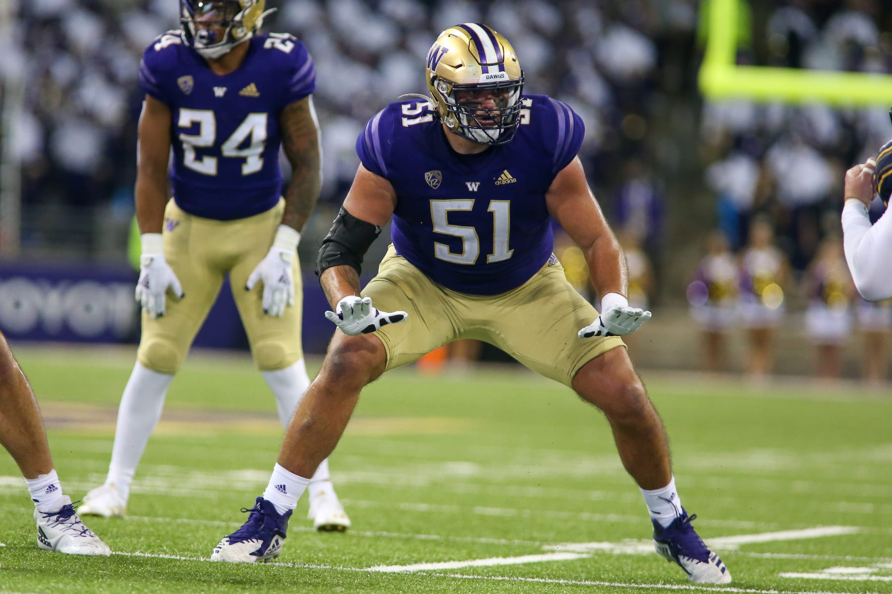 SEATTLE, WA - SEPTEMBER 25: Washington Huskies offensive lineman Jaxson Kirkland (51) blocks during a college football game between the California Golden Bears and the Washington Huskies on September 25, 2021, at Husky Stadium in Seattle, WA. (Photo by Jacob Snow/Icon Sportswire via Getty Images)