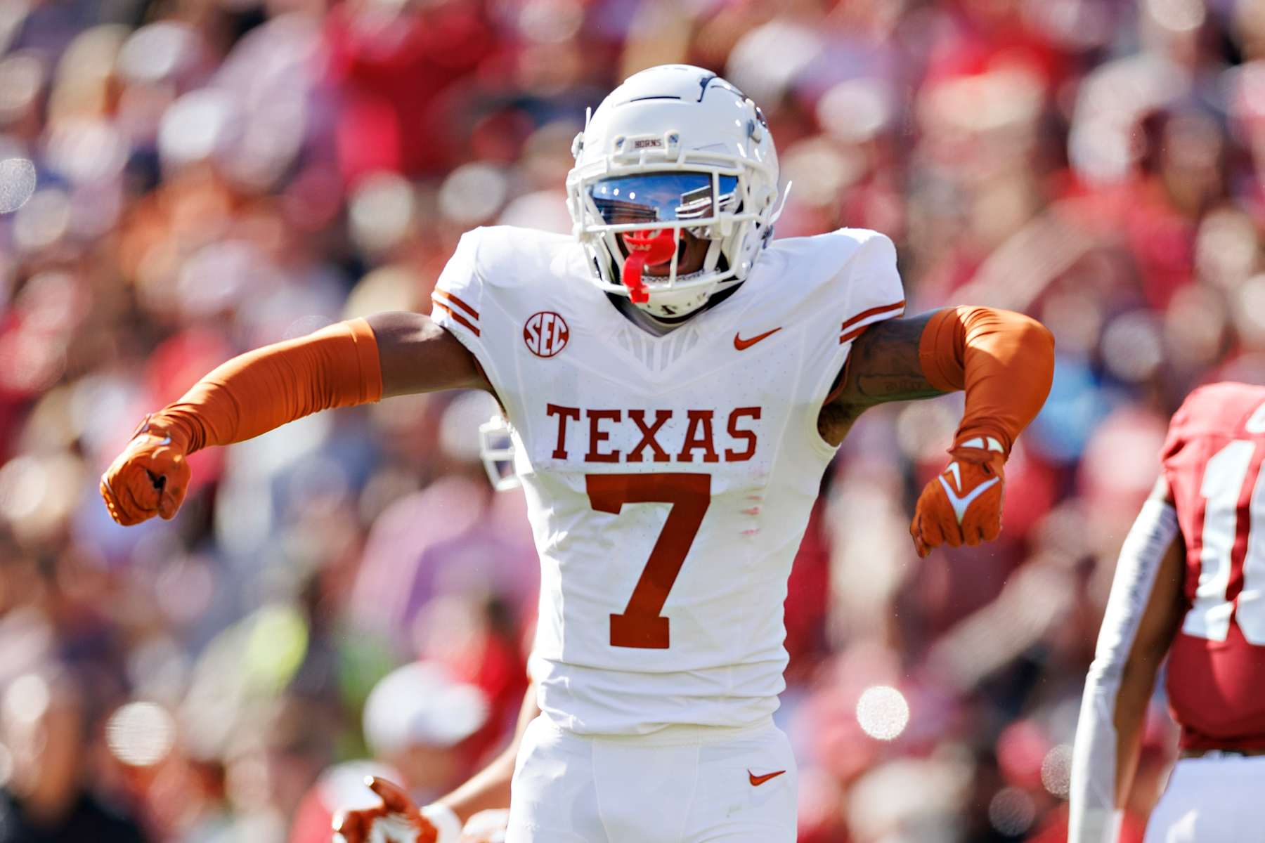 FAYETTEVILLE, ARKANSAS - NOVEMBER 16: Jahdae Barron #7 of the Texas Longhorns celebrates after sacking the quarterback during a game against the Arkansas Razorbacks at Donald W. Reynolds Razorback Stadium on November 16, 2024 in Fayetteville, Arkansas. The Longhorns defeated the Razorbacks 20-10.  (Photo by Wesley Hitt/Getty Images)