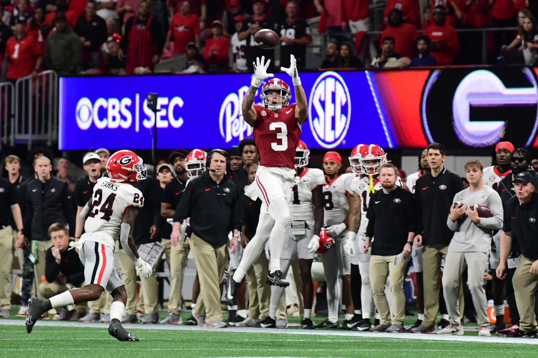 ATLANTA, GA - DECEMBER 2: Jermaine Burton #3 makes a leaping catch during a game between University of Georgia and University of Alabama at Mercedes Benz Stadium on December 2, 2023 in Atlanta, Georgia. (Photo by Perry McIntyre/ISI Photos/Getty Images)