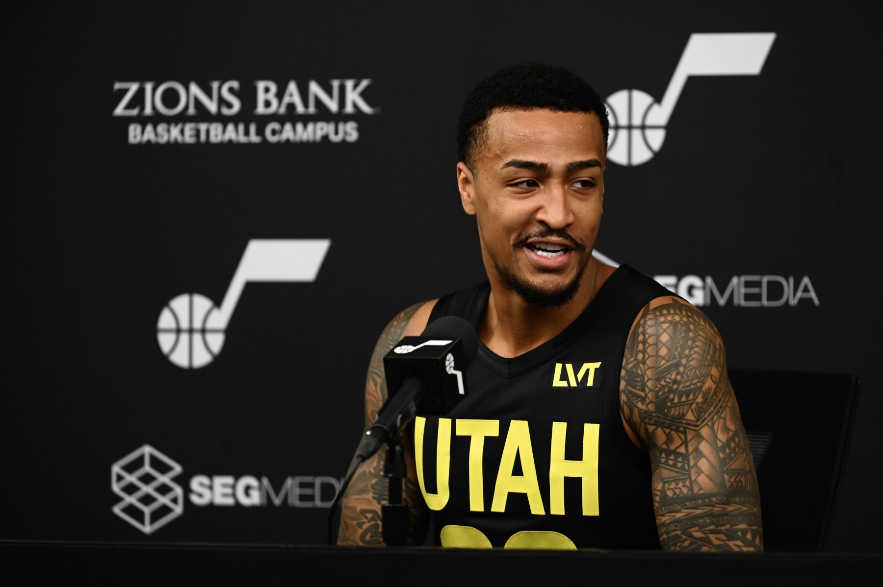 SALT LAKE CITY, UTAH - OCTOBER 02: John Collins #20 of the Utah Jazz speaks during the Utah Jazz Media Day at Zions Bank Basketball Campus on October 02, 2023 in Salt Lake City, Utah. NOTE TO USER: User expressly acknowledges and agrees that, by downloading and or using this photograph, User is consenting to the terms and conditions of the Getty Images License Agreement. (Photo by Alex Goodlett/Getty Images)