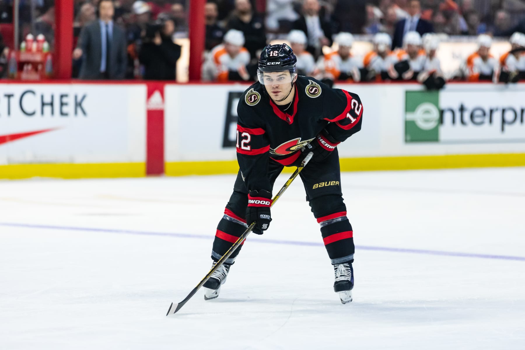 OTTAWA, ON - MARCH 30: Ottawa Senators Left Wing Alex DeBrincat (12) before a face-off during second period National Hockey League action between the Philadelphia Flyers and Ottawa Senators on March 30, 2023, at Canadian Tire Centre in Ottawa, ON, Canada. (Photo by Richard A. Whittaker/Icon Sportswire via Getty Images)